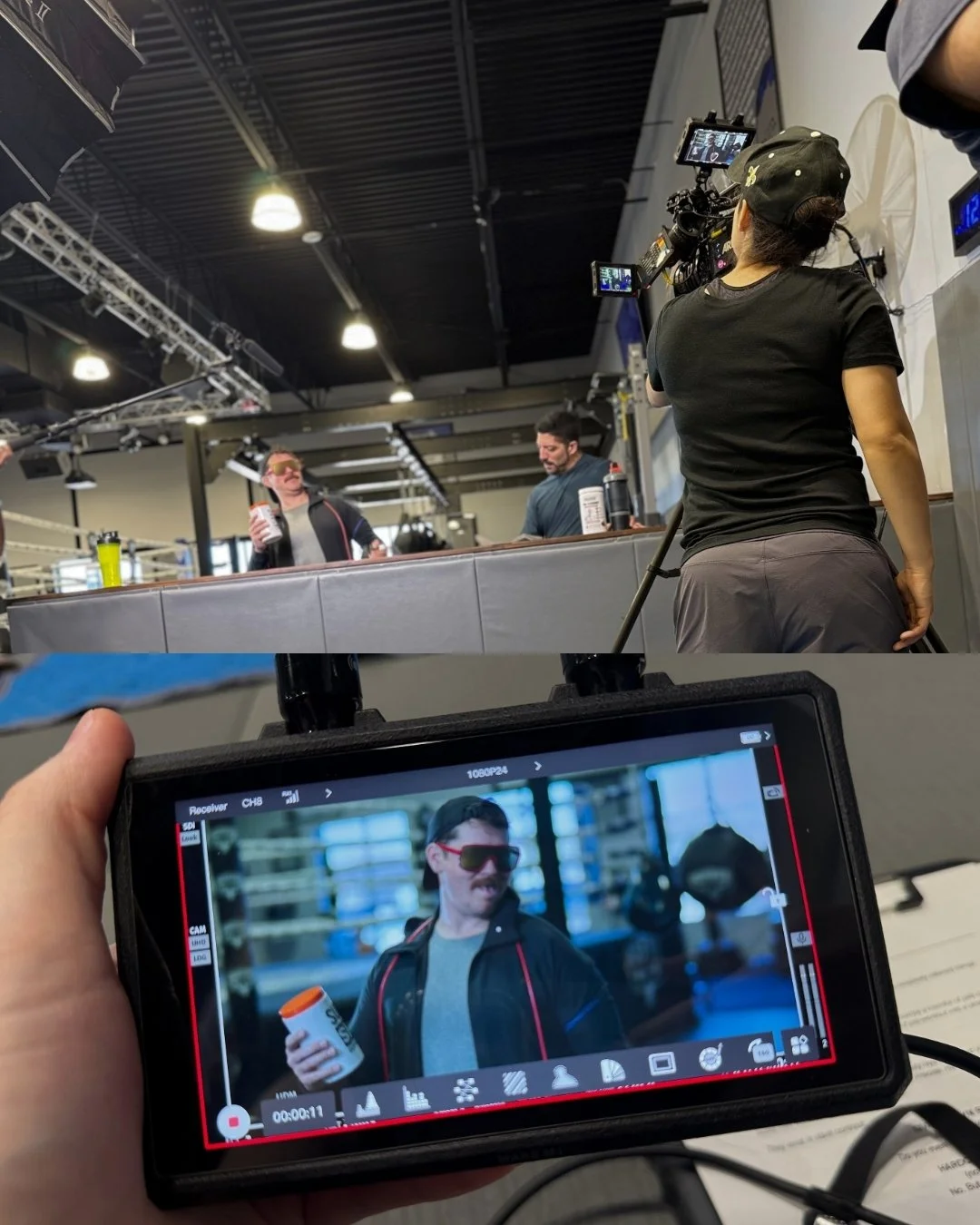 Filming a scene in a gym with a person holding a drink, being recorded by a camera operator, with a monitor showing a woman with sunglasses holding a bottle.