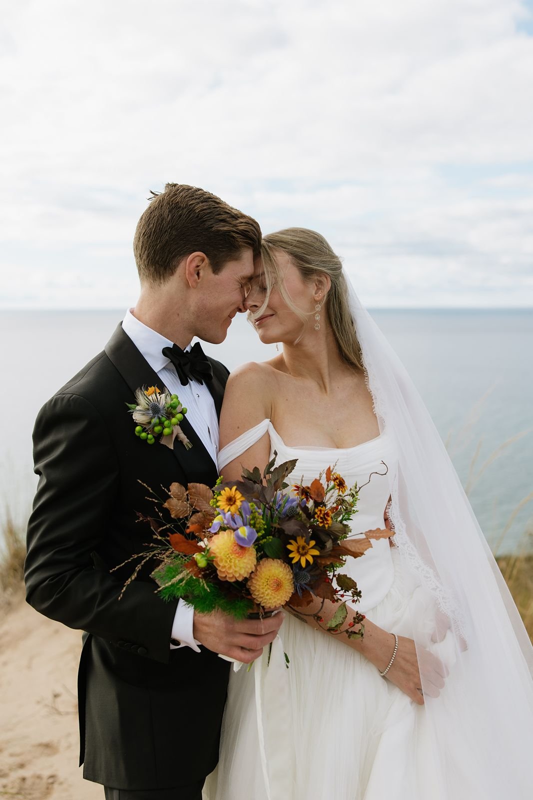 A-Lake-Michigan-Wedding-bride-and-groom-kiss.jpg