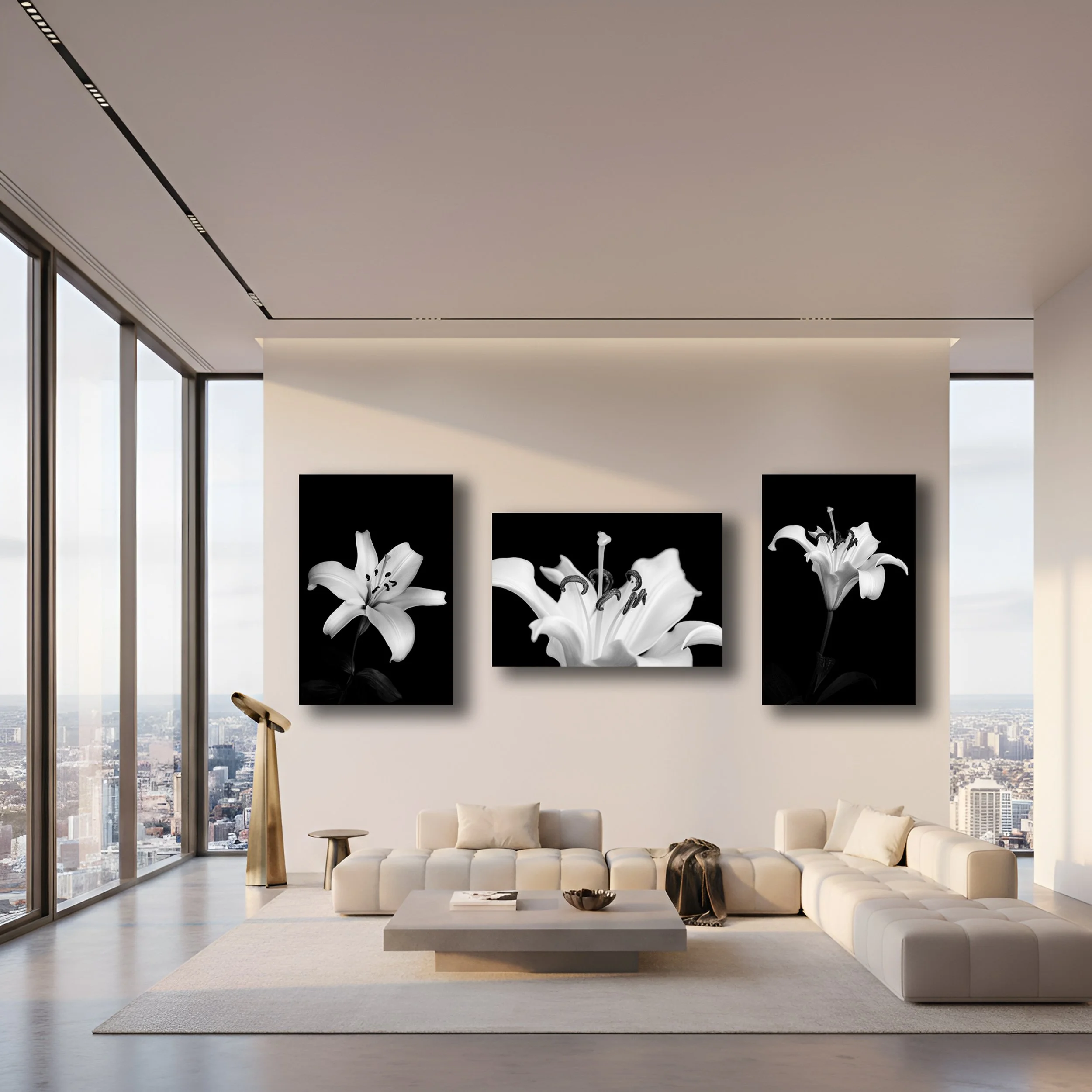 Three black and white lily photos on acrylic make up a penthouse gallery wall triptych.