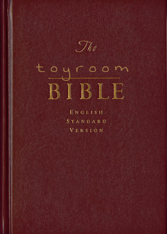 Cover of a book titled 'The Toyroom Bible, English Standard Version' with a dark red background and gold lettering.