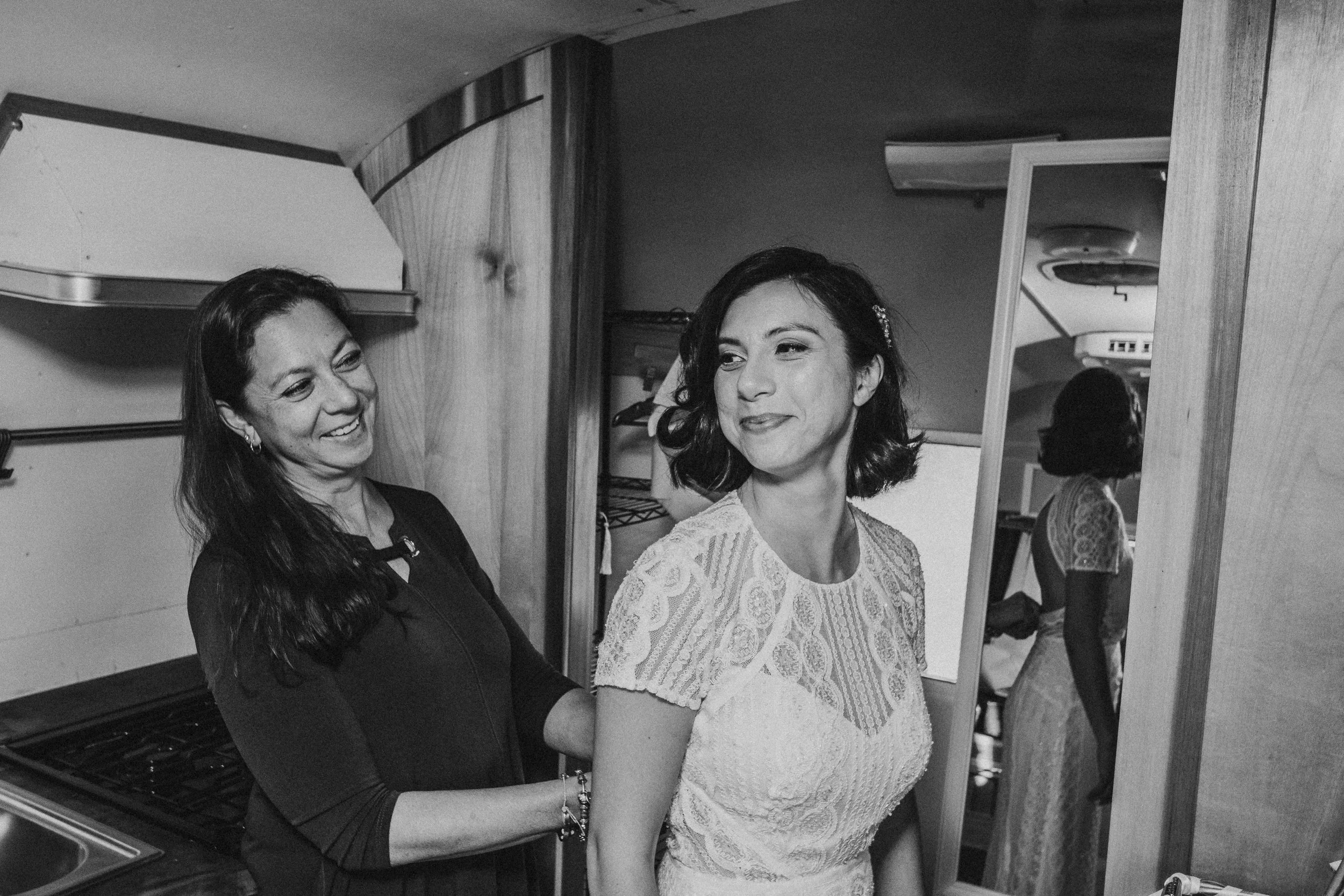 bride getting ready in the camper at burning barrel in lecompton kansas