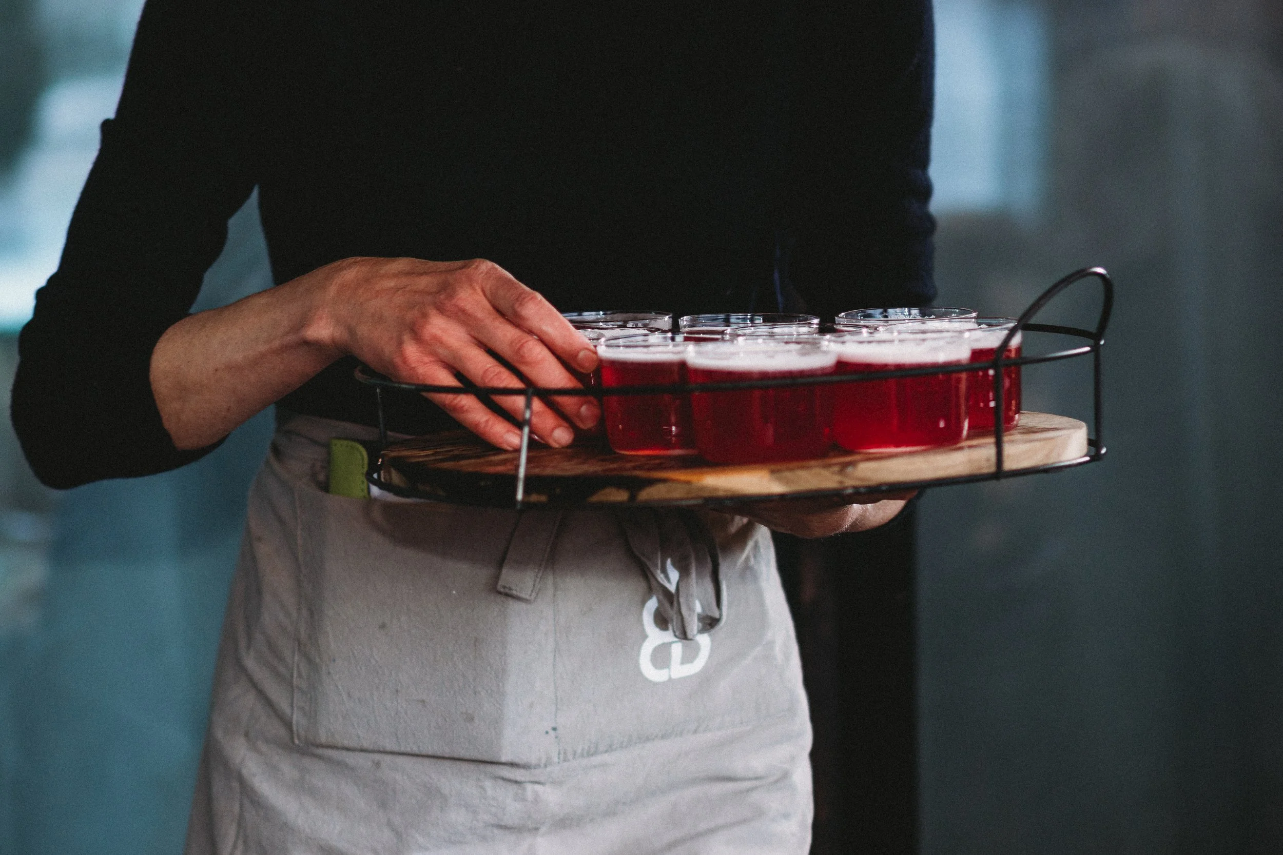 Burning Barrel Waitress Passing Out Drinks