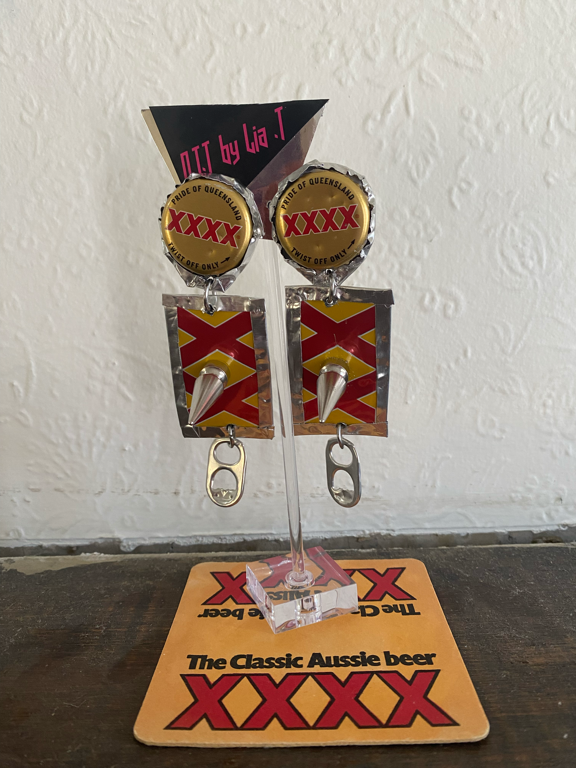 XXXX Tinnie earrings 2023. Upcylced aluminium cans, metal spikes.