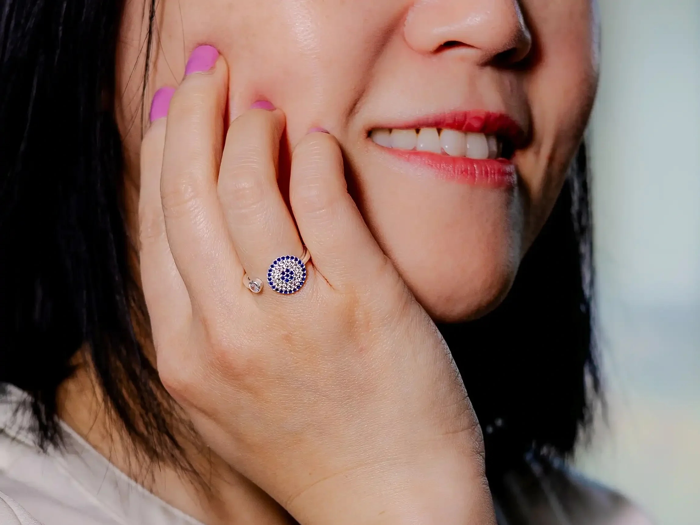 model wearing evil eye jewelry