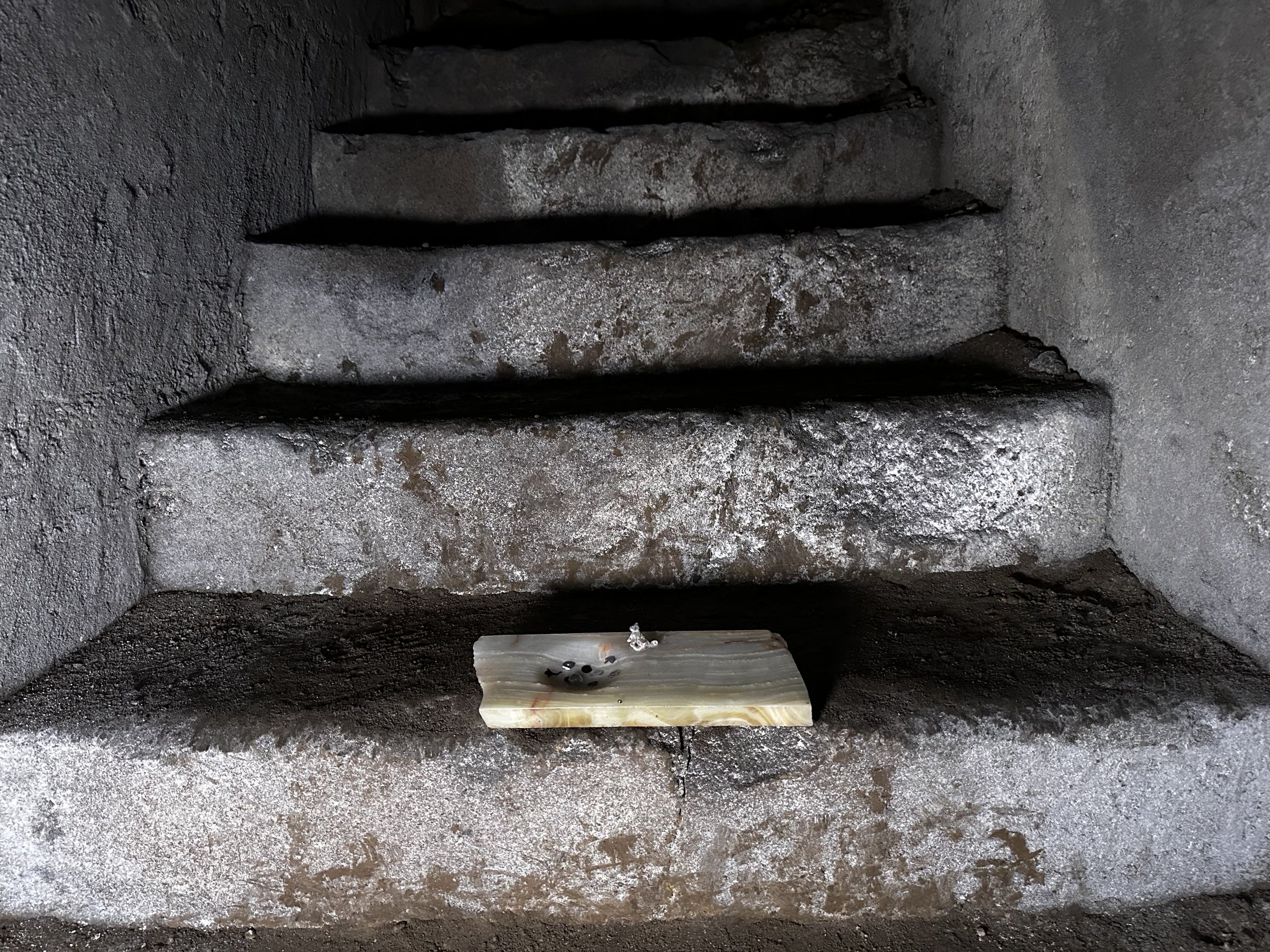 WHAT SHAPE SHOULD I FILE MY NAILS, LONG ENOUGH TO FILE MEMORIES BENEATH MY NAILS, MEMORIES FILED SMALL ENOUGH TO BE SAFE UNDER MY NAILS, SAVOURED LATER — onyx sculpture / scultura in onice by Italian contemporary artist Ambra Viviani, presented at th