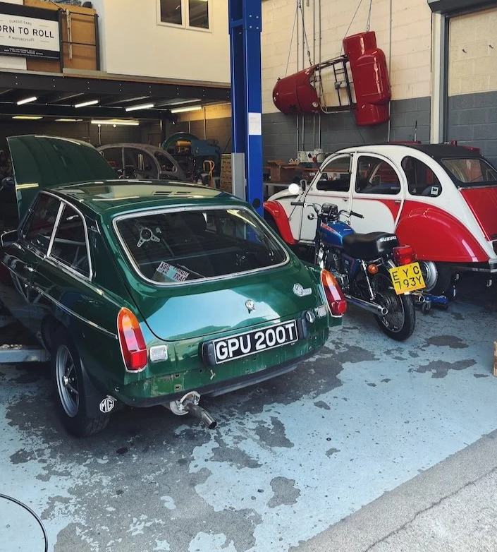 classic cars being serviced at our Bristol workshop