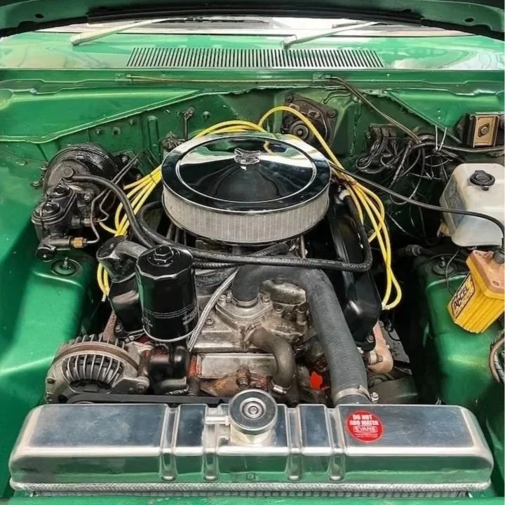 american muscle car engine being serviced in bristol