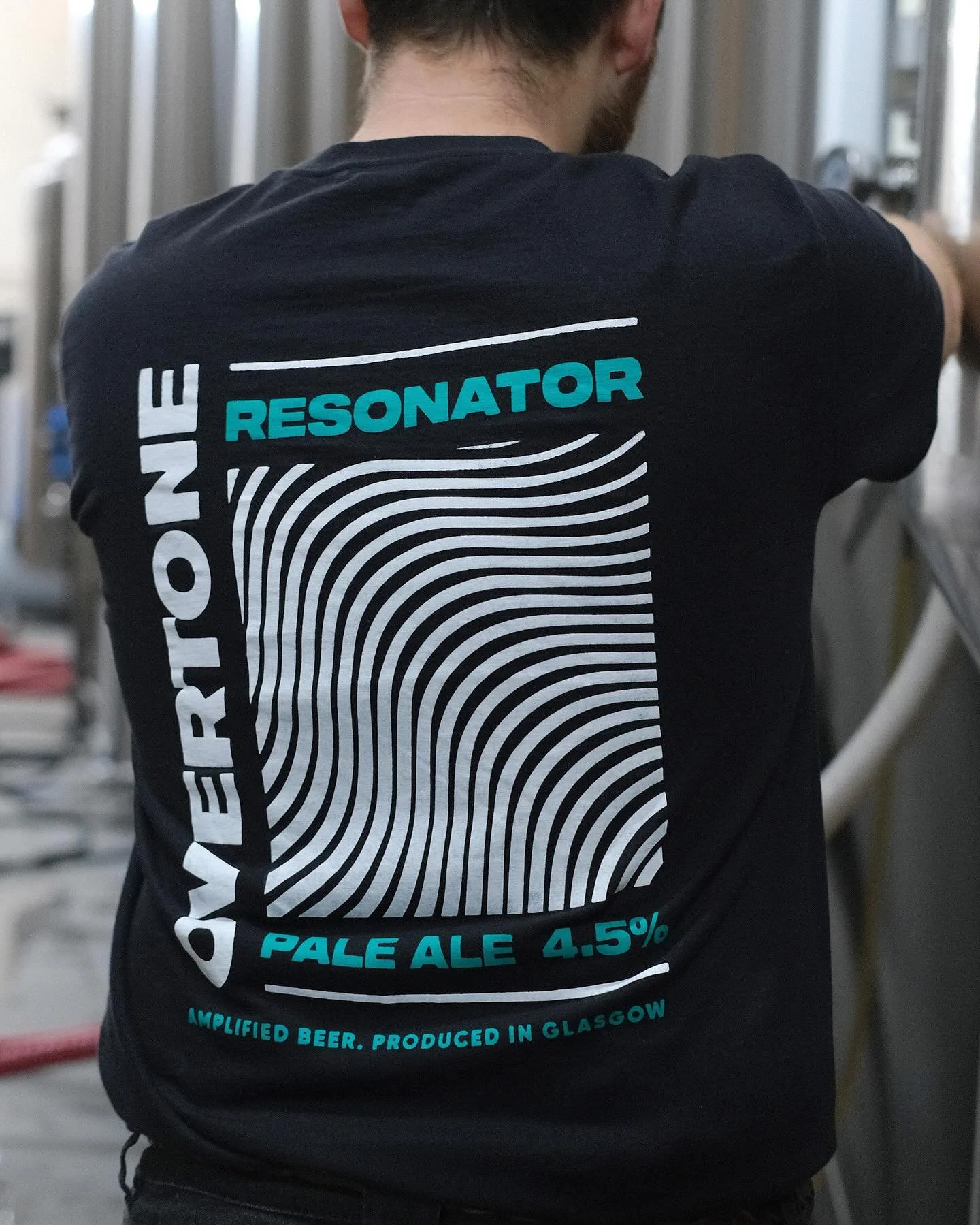 Resonator T-shirts are here!

Show your love for our core New England Pale Ale in style with this classic Russell Europe tee made from 100% organic cotton, soft and breathable.

Featuring the Overtone logo on the front and Resonator artwork on the ba
