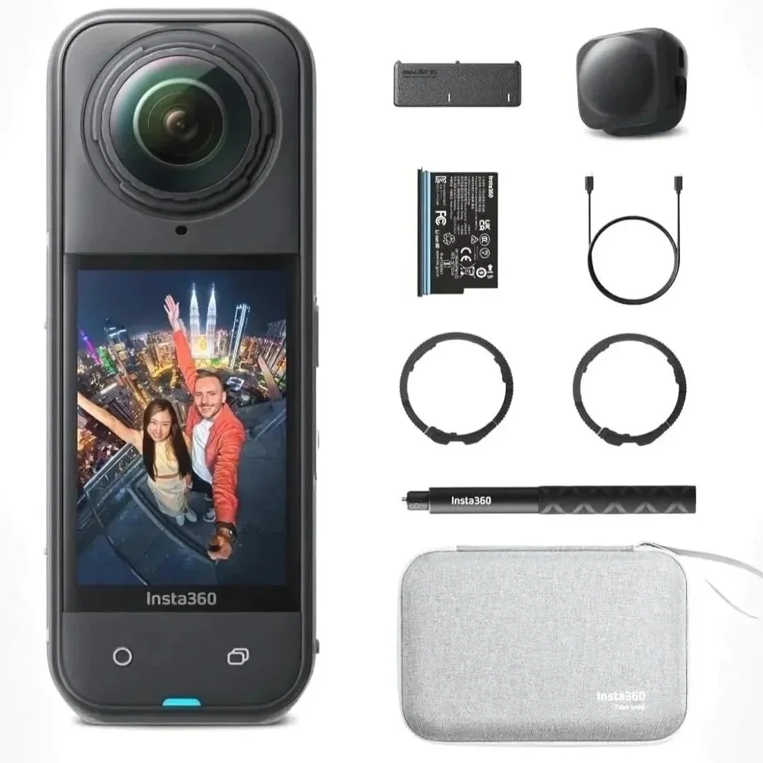A portable Insta360 camera with a large lens, a touchscreen displaying two people in front of the city skyline, a battery, a charging case, two lens rings, a stick, a cable, and a small black speaker.