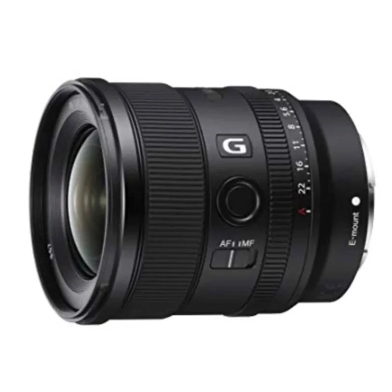 A black Sony G-series camera lens with manual focus and aperture controls.