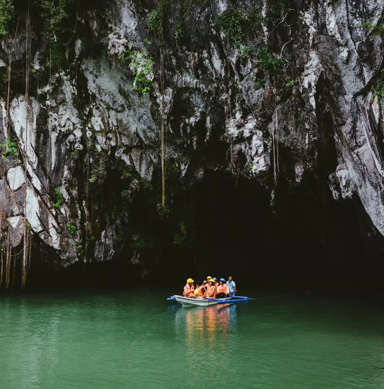 Puerto Princesa travel guide in Palawan, Philippines featuring coastal views, the Baywalk waterfront, and gateway access to the famous Underground River.