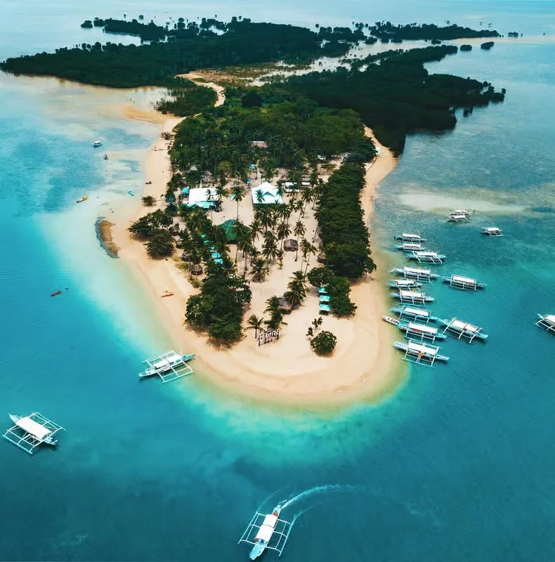 Puerto Princesa travel guide in Palawan, Philippines featuring coastal views, the Baywalk waterfront, and gateway access to the famous Underground River.