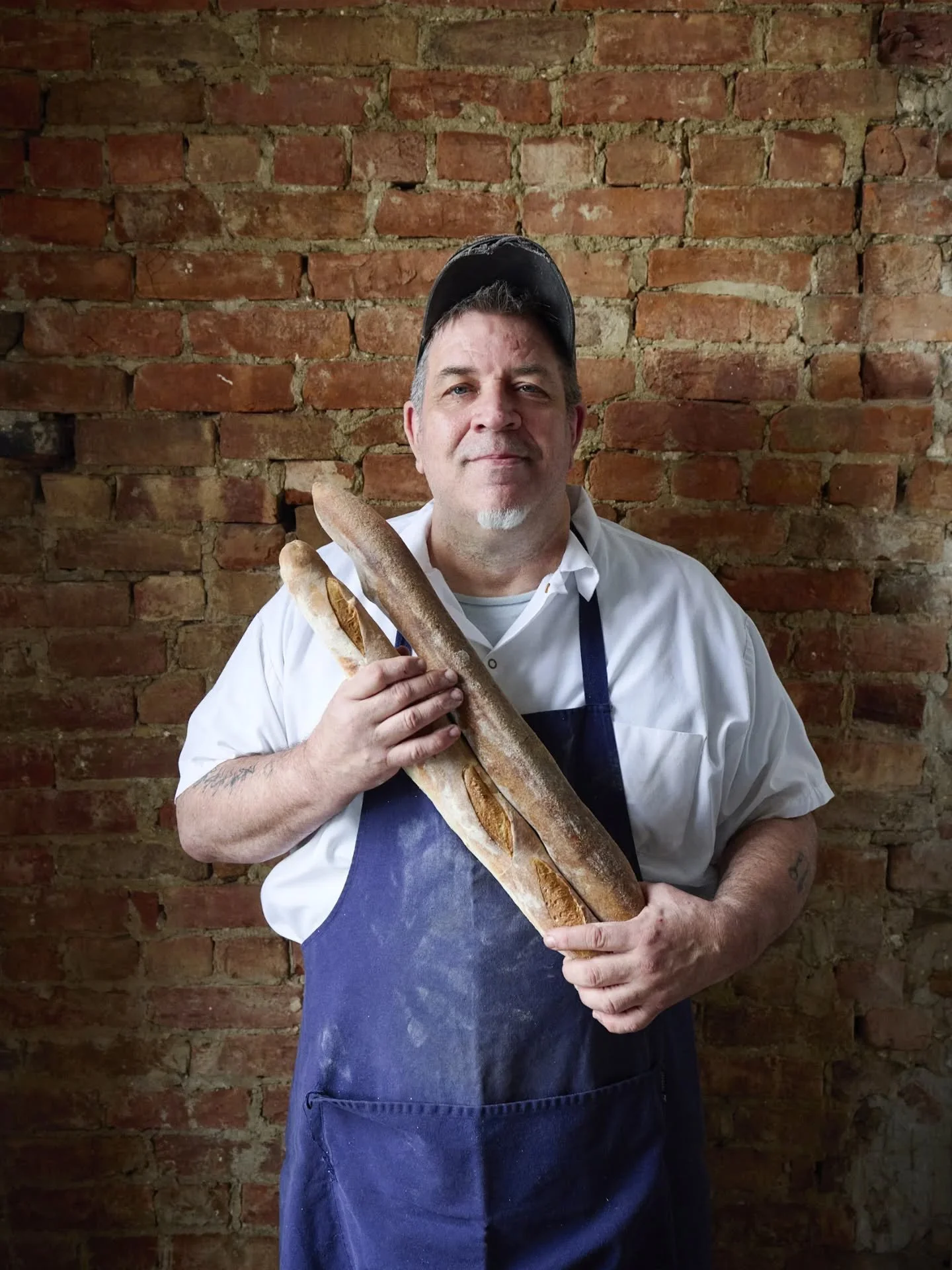 Chef Jamie &amp; baguettes

Wishing you all a Happy Thanksgiving! We will be closed Thanksgiving day, reopening Friday, November 28.
.
.
#LaFamilleLePerche #Portraits #LePercheHudson