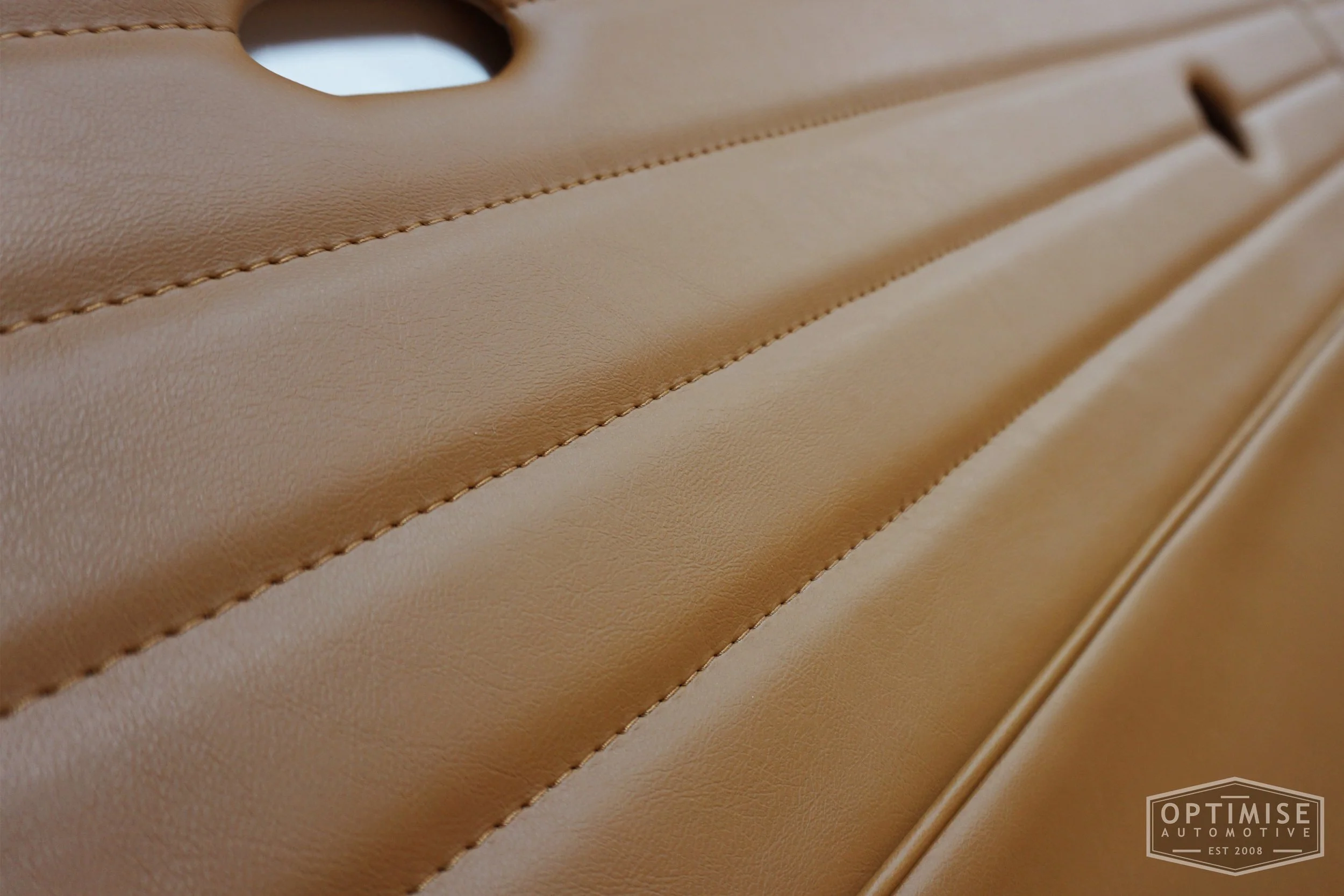 Classic Mini Monte-Carlo Plus door cards, trimmed in light brown (tan) vinyl leatherette with light brown (tan) piping & stitching.
