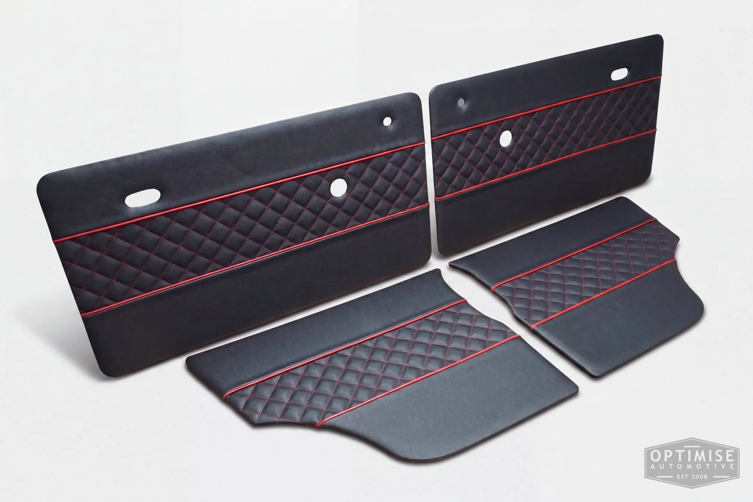 Classic Mini Wide-Stripe Fluted door cards, trimmed in black leather with red piping & diamond stitching.
