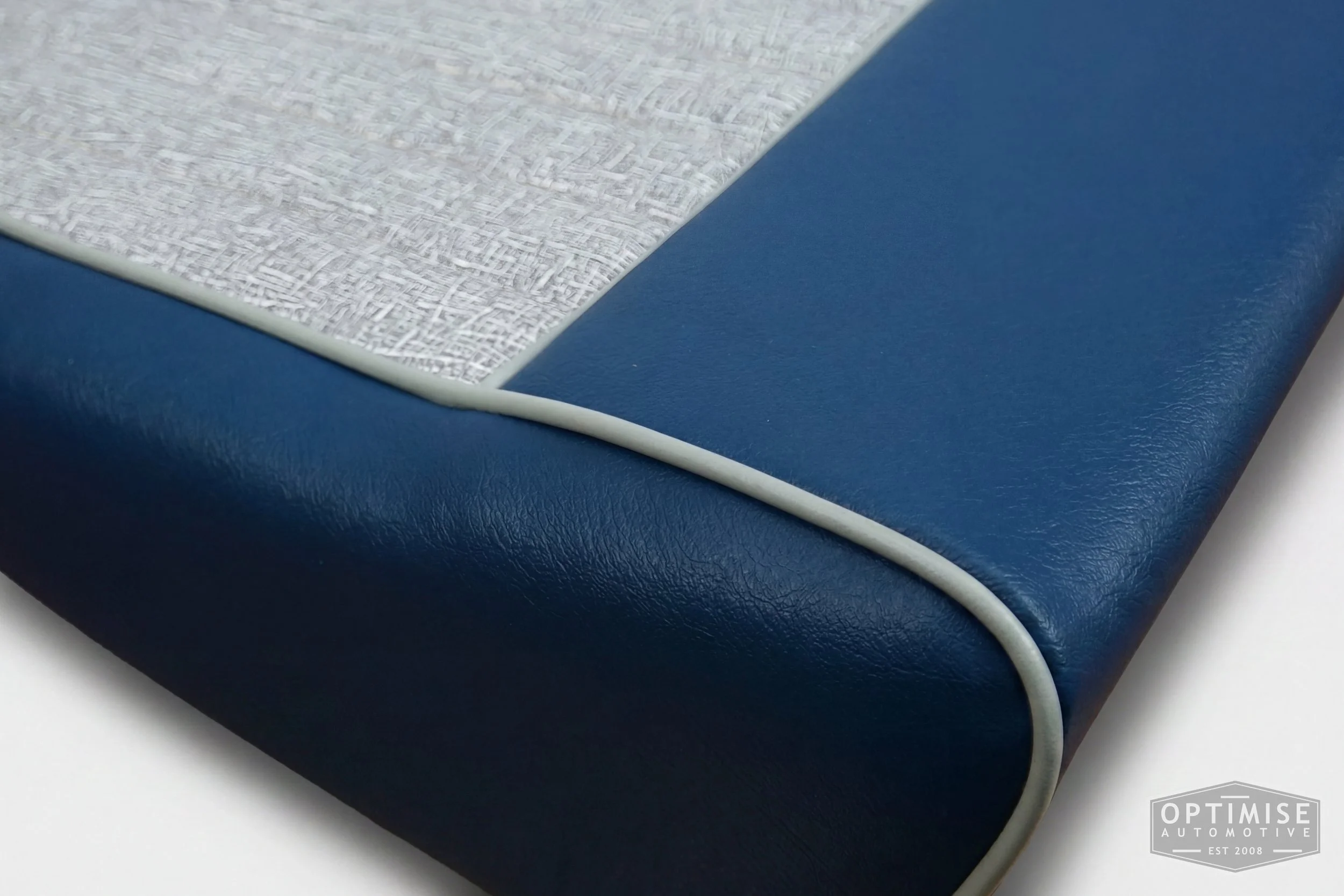 Classic Mini non-reclining seat retrims, trimmed in grey fleck and isis blue vinyl leatherette.