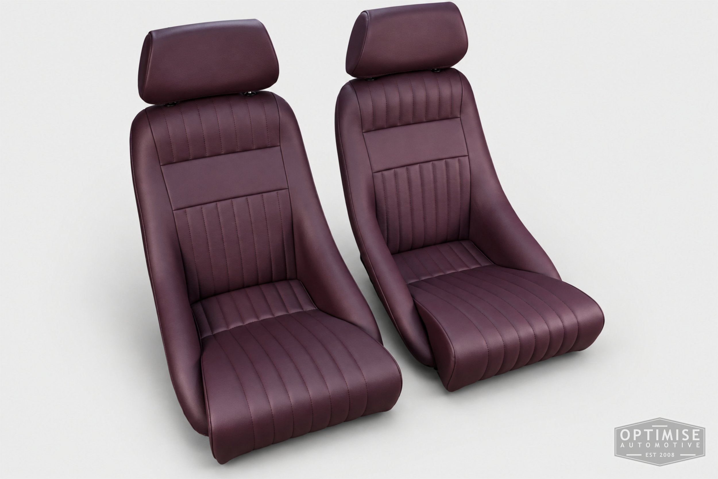 Classic Mini seat retrims featuring Cobra Monte Carlo front seats, trimmed in Caledonian aubergine leather.