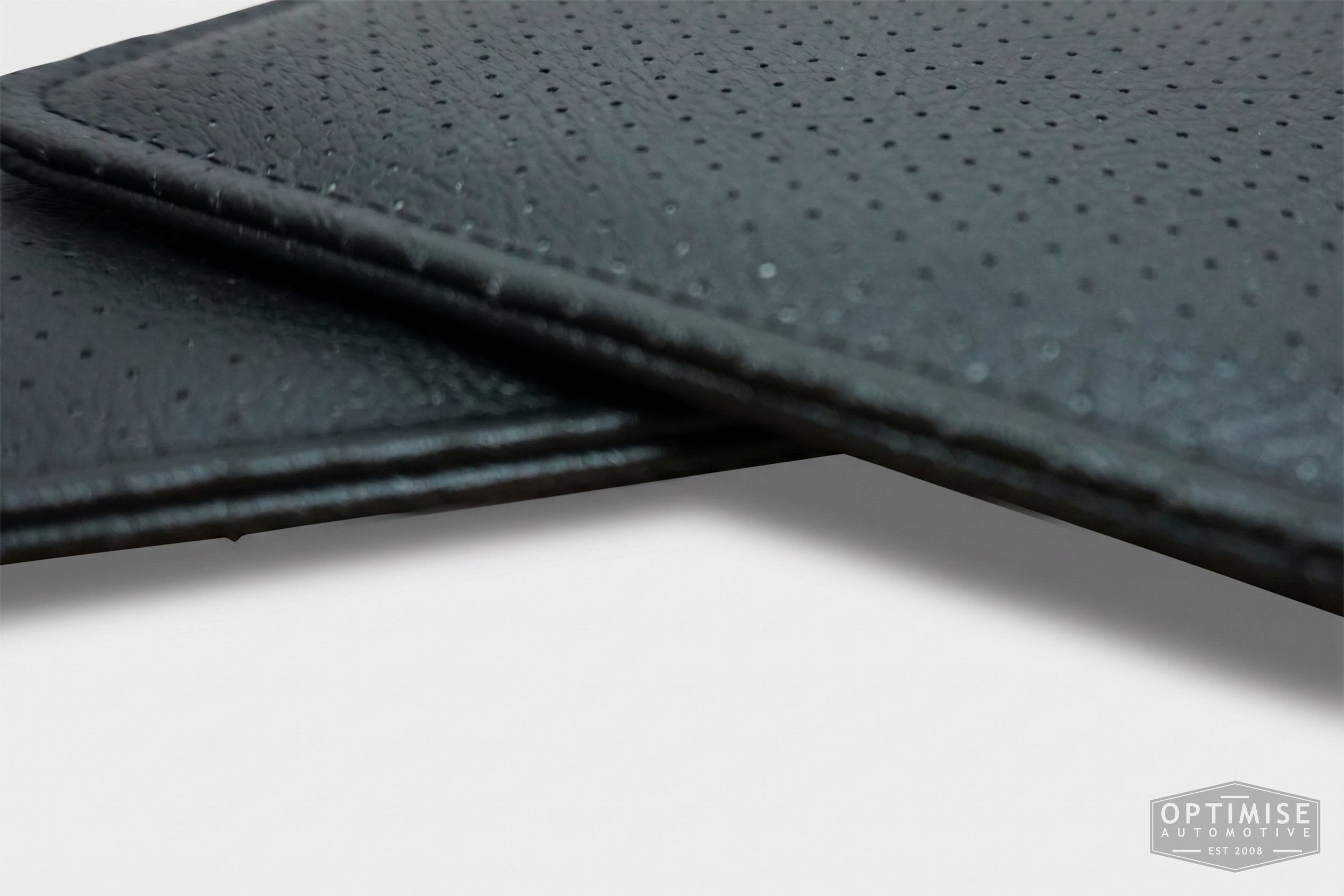Classic Mini sun visor retrims, trimmed in black PVC perforate.