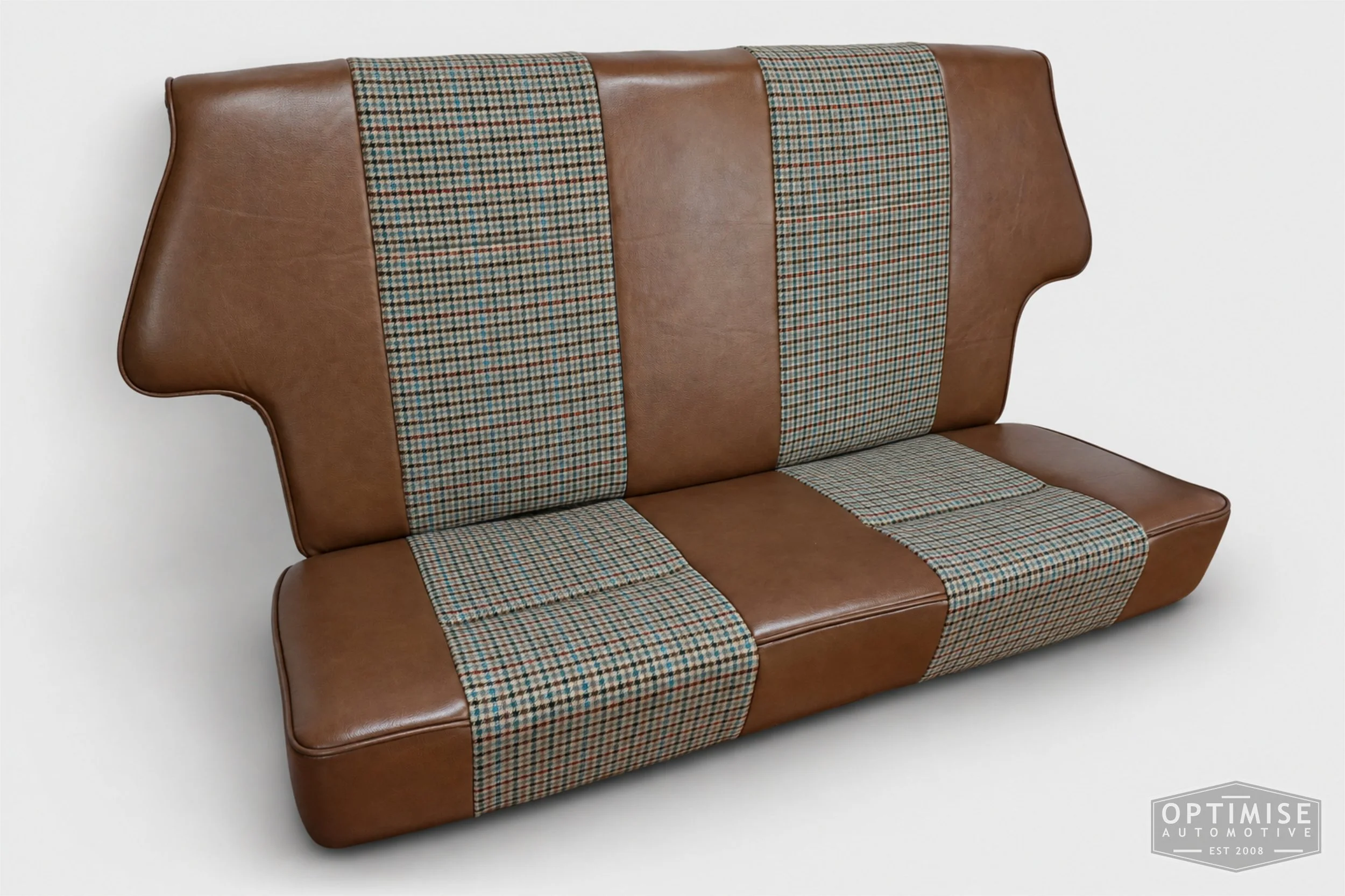Classic Mini seat retrims featuring original SPi front seats and a matching rear seat, trimmed in Crest Cambridge lark leather and Ashdown Check fabric 145.