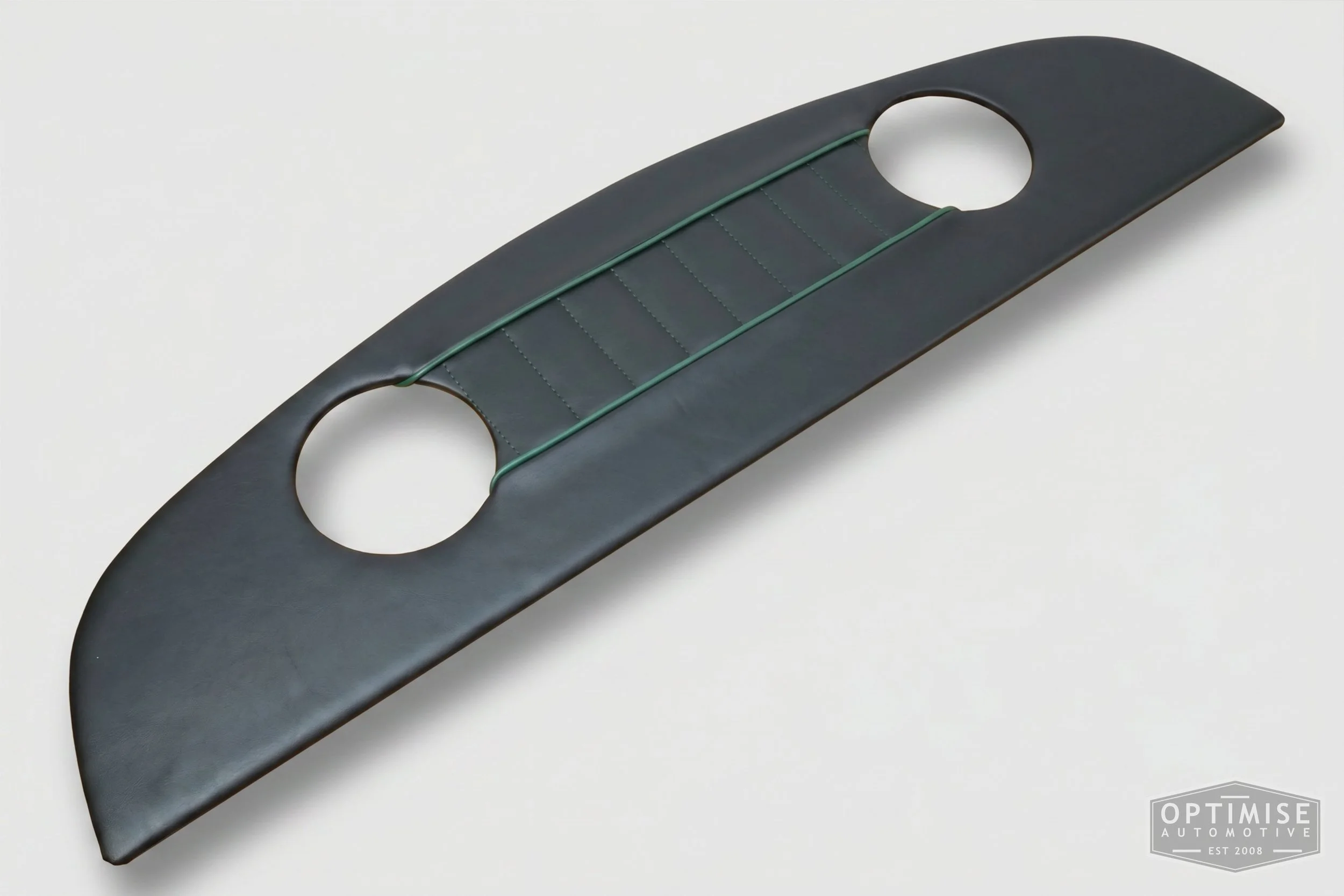 Classic Mini parcel shelf board, trimmed in black vinyl leatherette with British racing green piping & stitching.