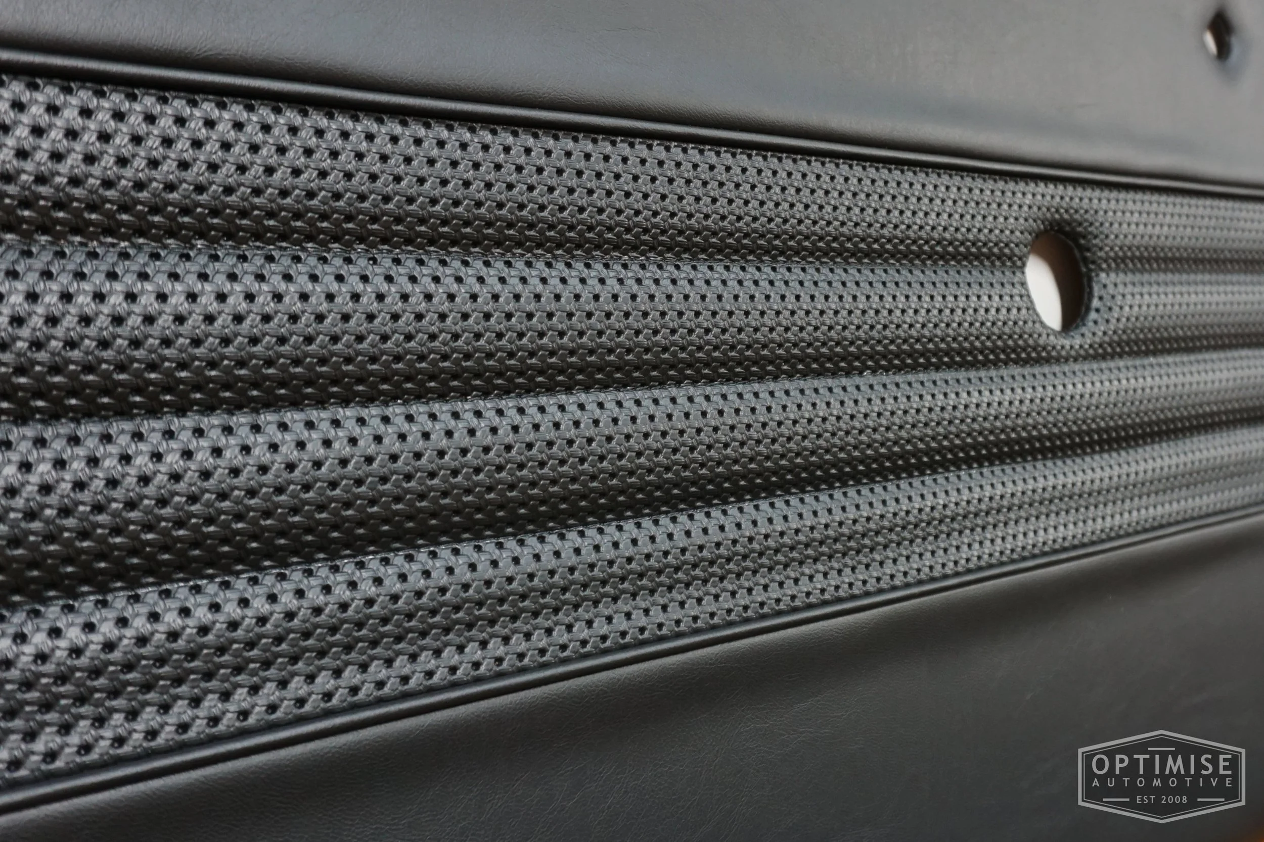 Classic Mini Wide-Stripe Fluted door cards, trimmed in black vinyl leatherette and black basketweave with black piping & stitching.
