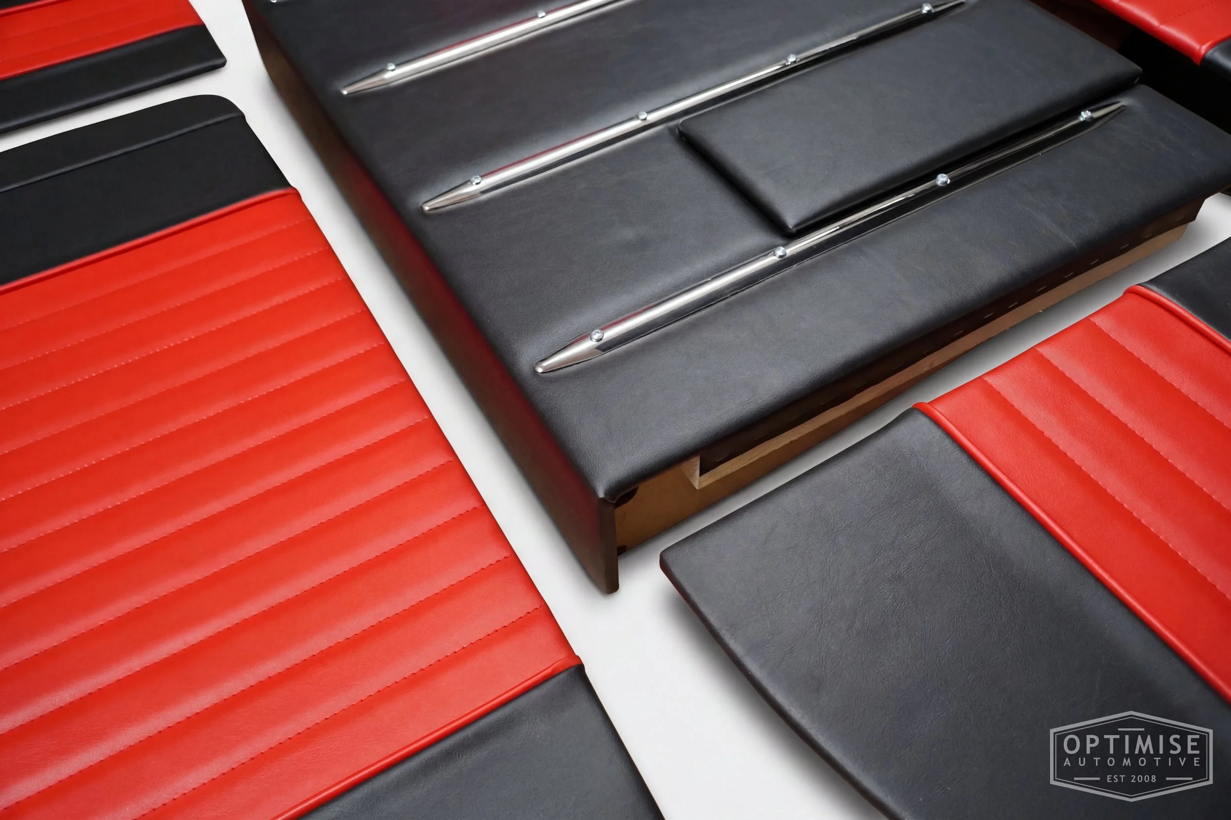 Classic Mini leatherette boot lining kit, trimmed in black and red leatherette with red piping and red stitching.