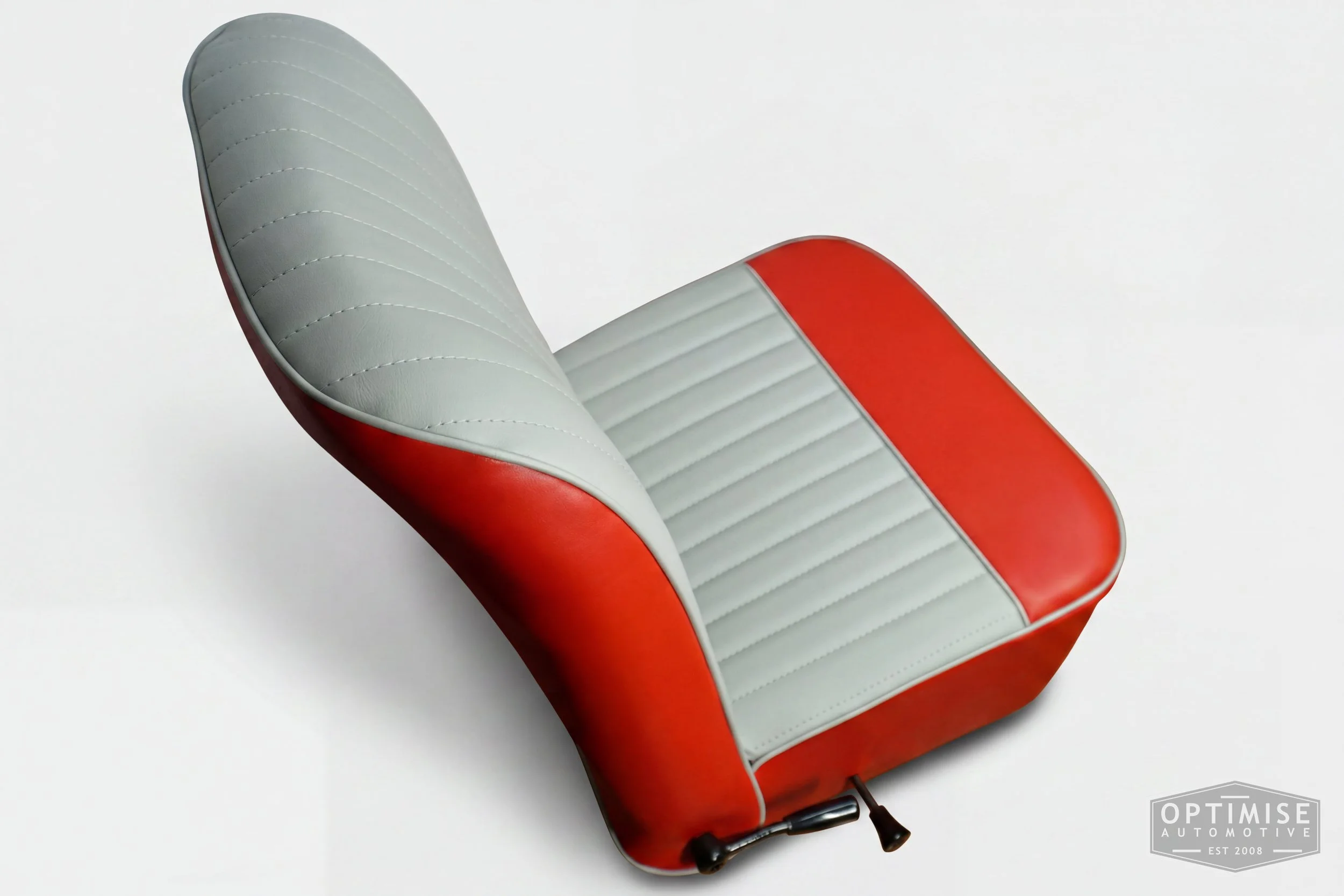 Classic Mini reclining seat retrims, trimmed in red and light grey vinyl leatherette.