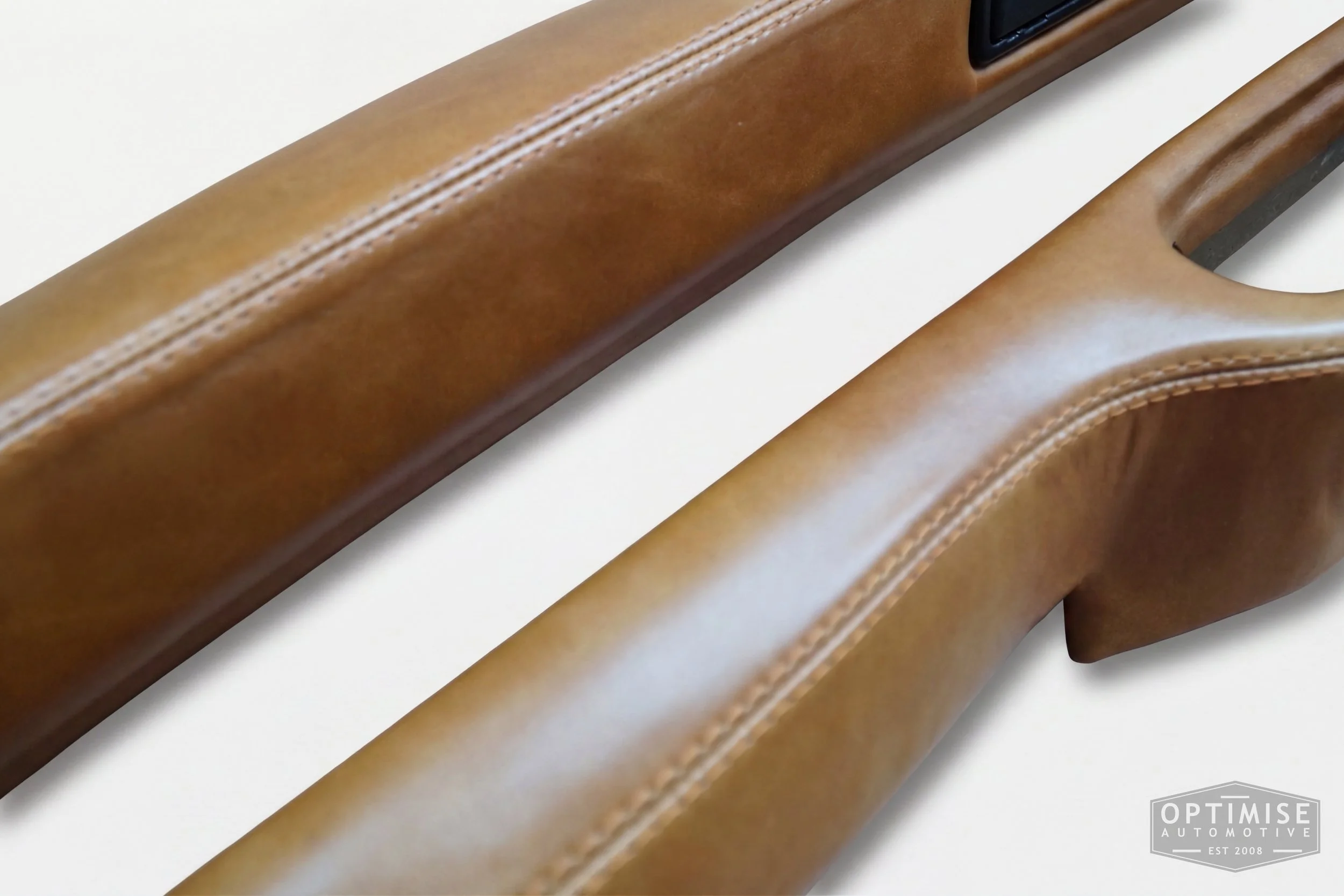 Classic Mini dash rail retrims, trimmed in Crest Legacy dark caramel leather.