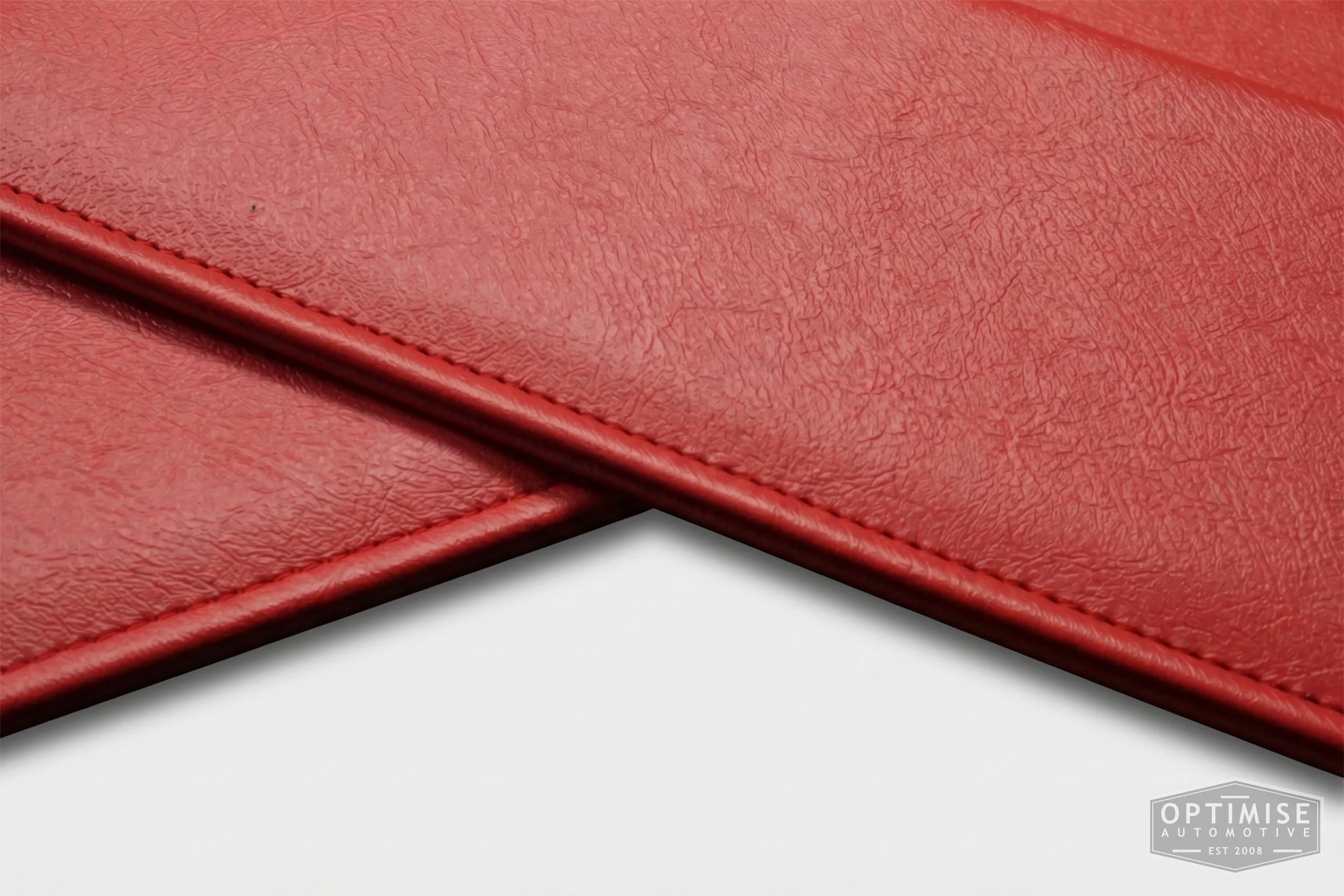 Classic Mini sun visor retrims, trimmed in red leatherette.