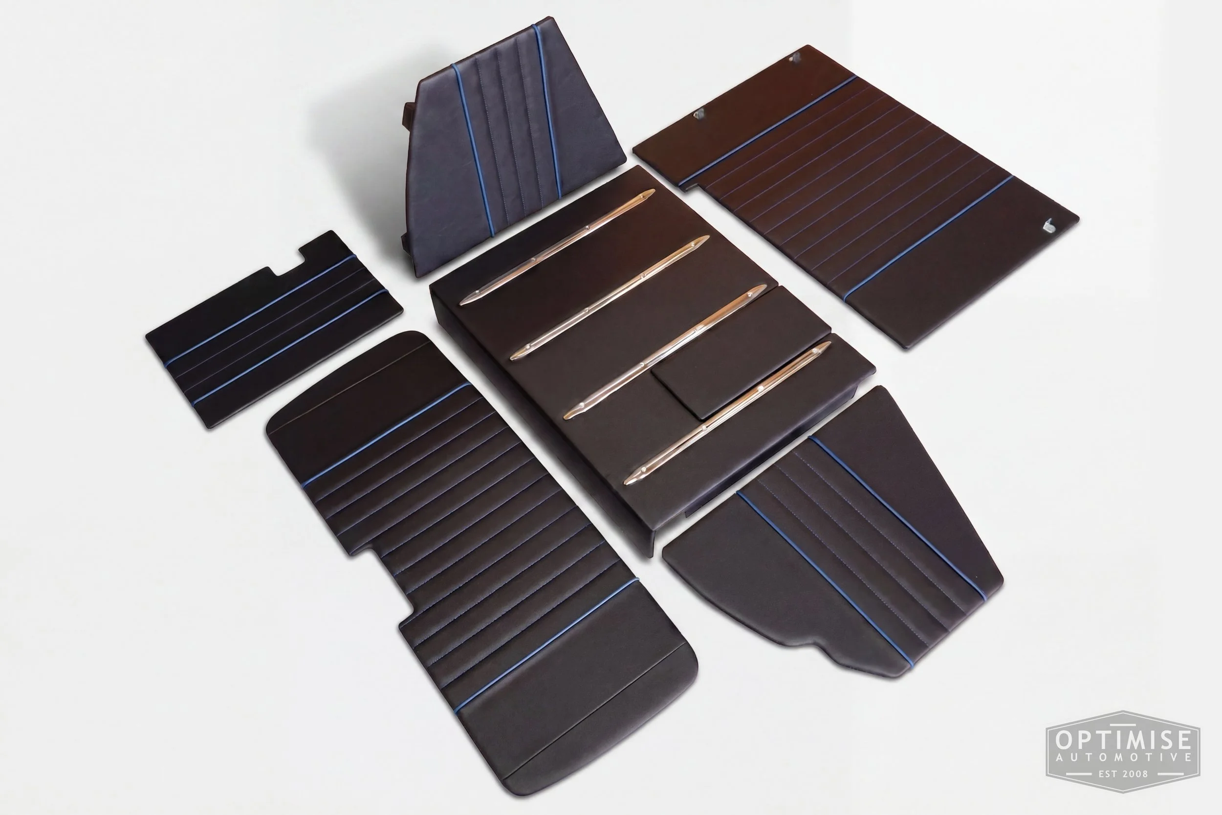 Classic Mini leatherette boot lining kit, trimmed in black leatherette with blue piping and blue stitching.