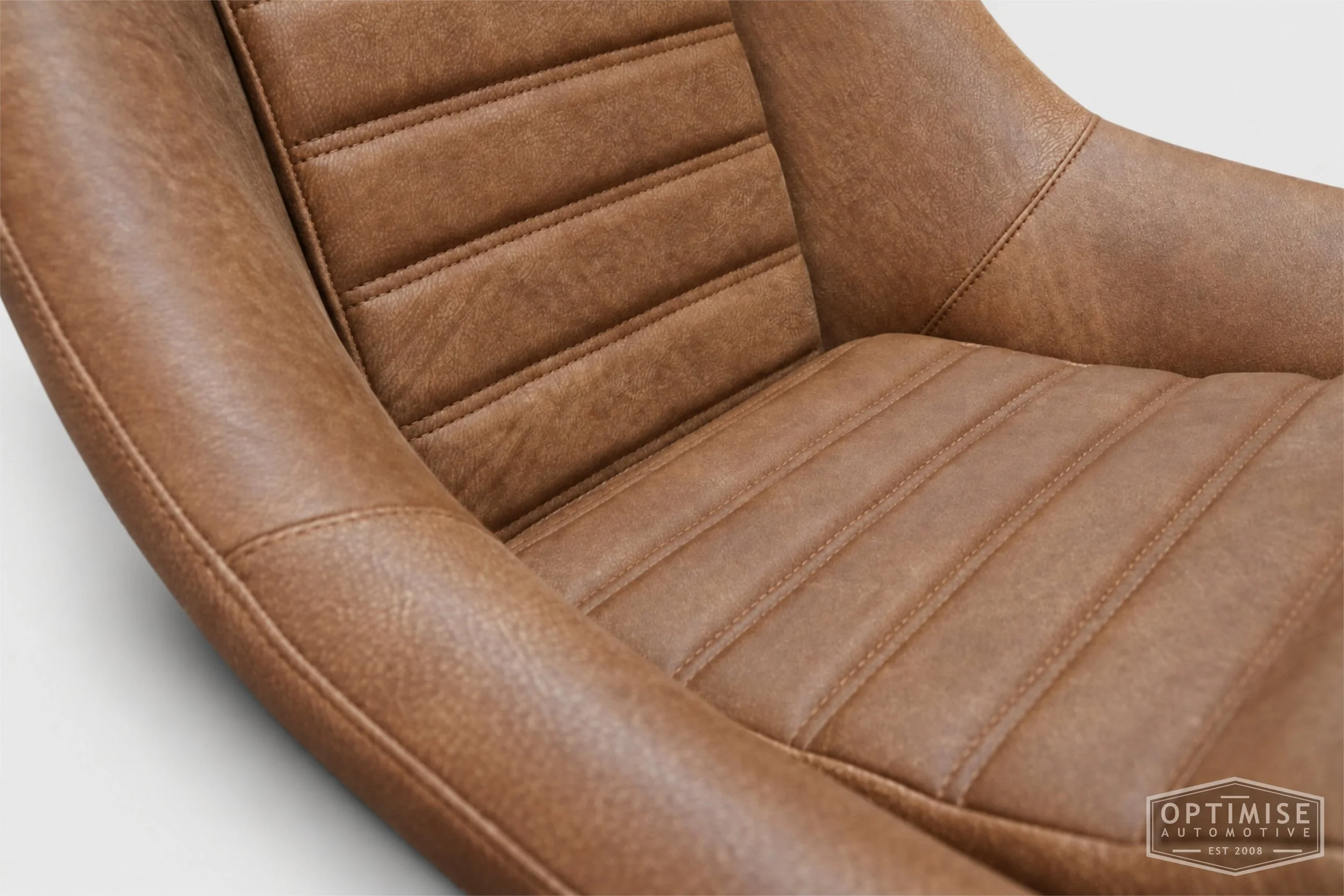 Classic Mini seat retrims featuring Cobra Classic RS front seats and a matching MK5 rear seat, trimmed in Crest Brunel walnut leather.