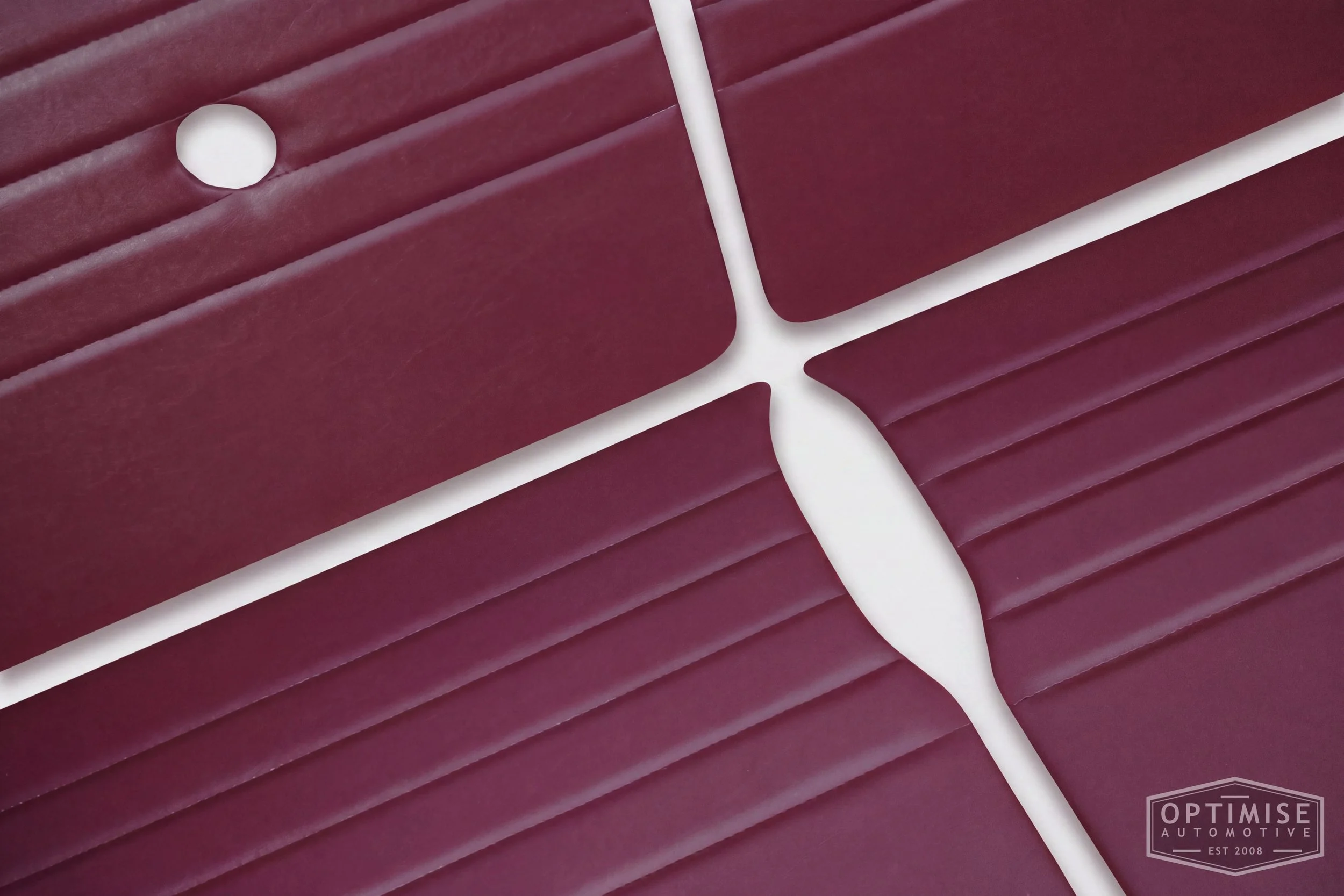 Classic Mini Monte-Carlo door cards, trimmed in burgundy vinyl leatherette with burgundy stitching.