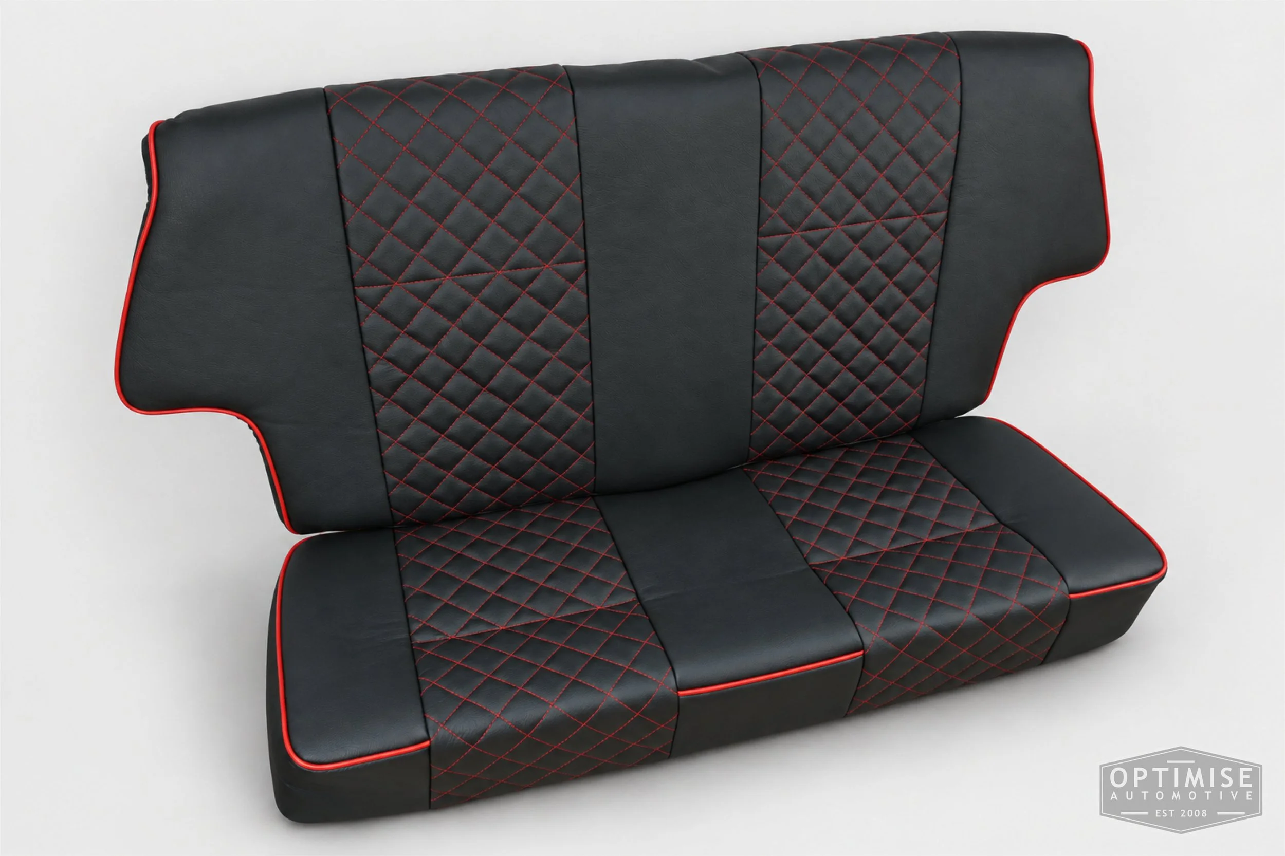 Classic Mini seat retrims featuring original MPi front seats and a matching rear seat, trimmed in black auto grain leather with red diamond stitching and piping.