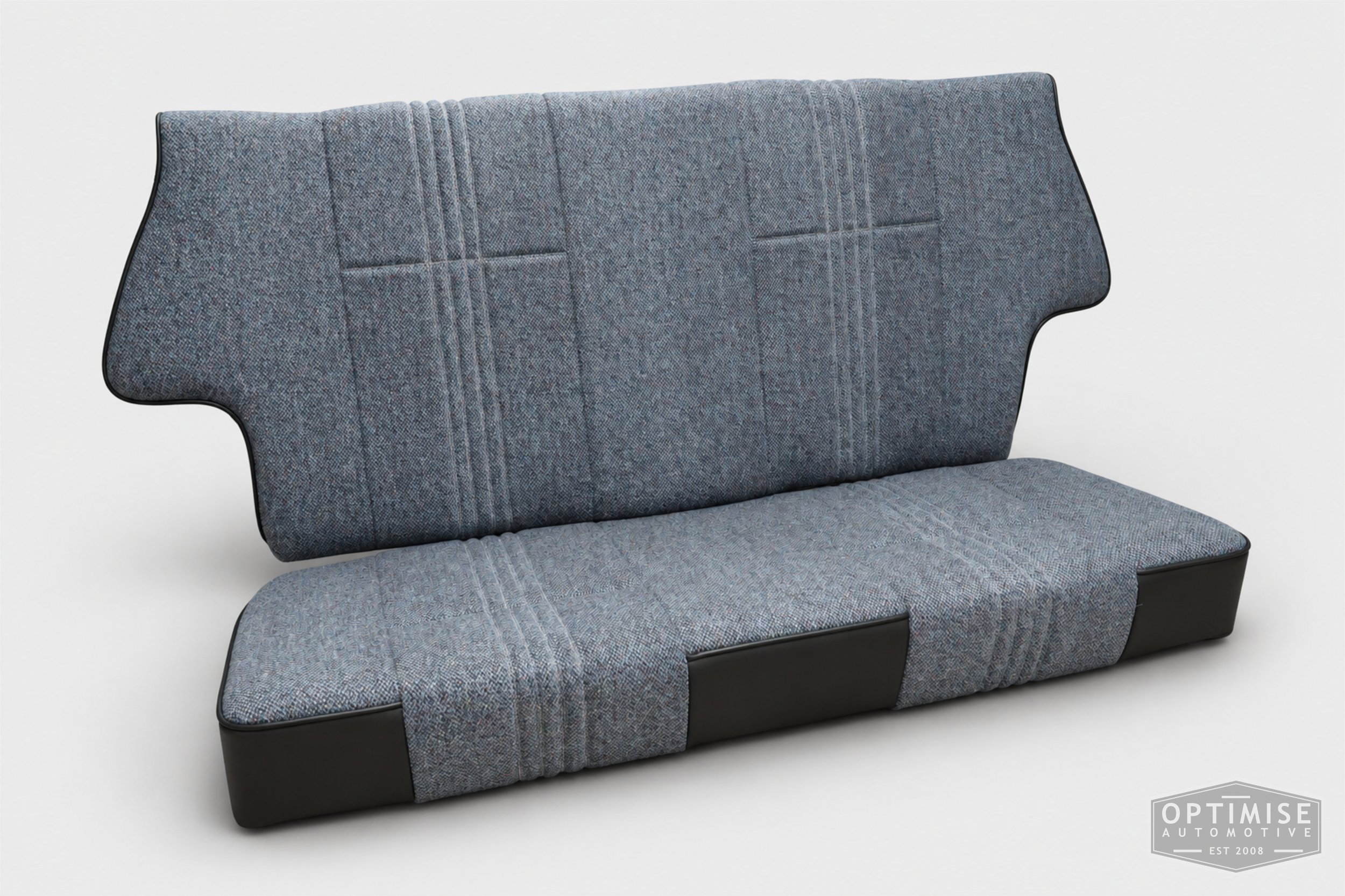 Classic Mini seat retrims featuring Cobra Le Mans front seats and a matching MK6 rear seat, trimmed in black leatherette and Harris Tweed blue Barleycorn BC1.