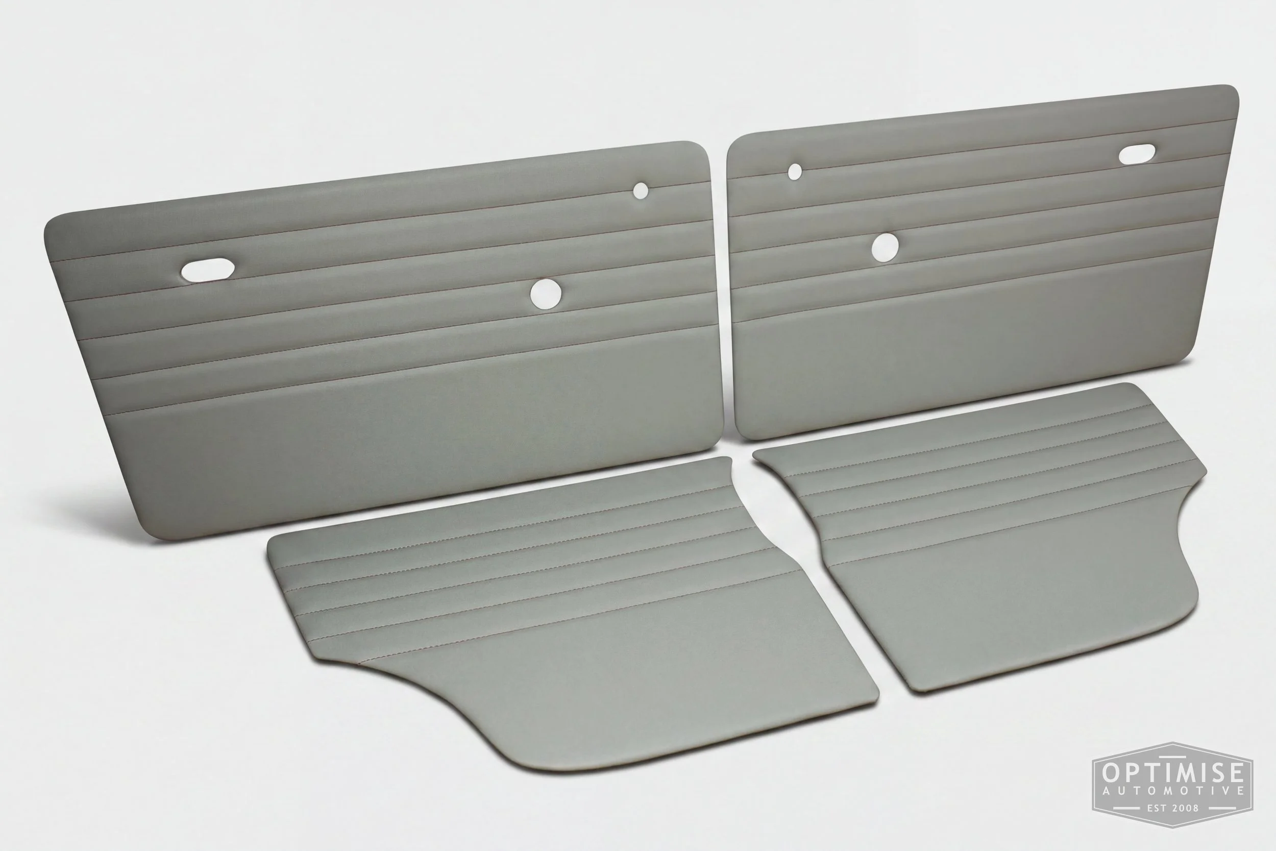 Classic Mini Monte-Carlo door cards, trimmed in light grey vinyl leatherette with red stitching.