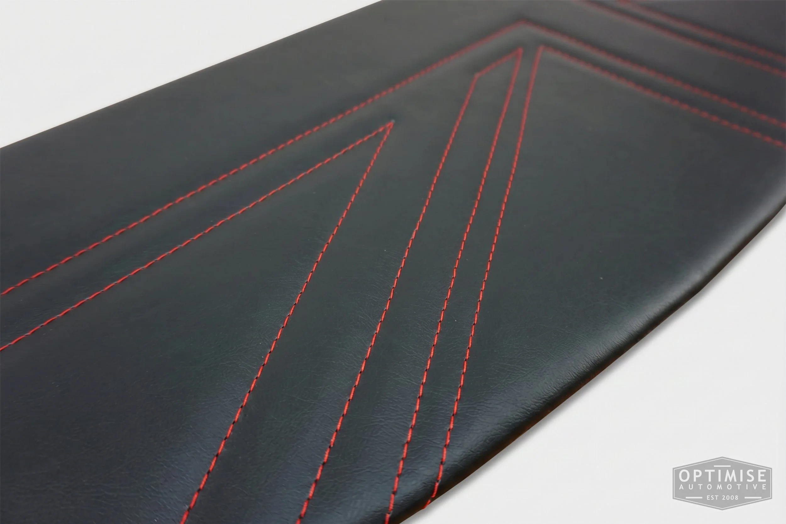 Classic Mini Union Jack parcel shelf board, trimmed in black vinyl leatherette with red stitching.