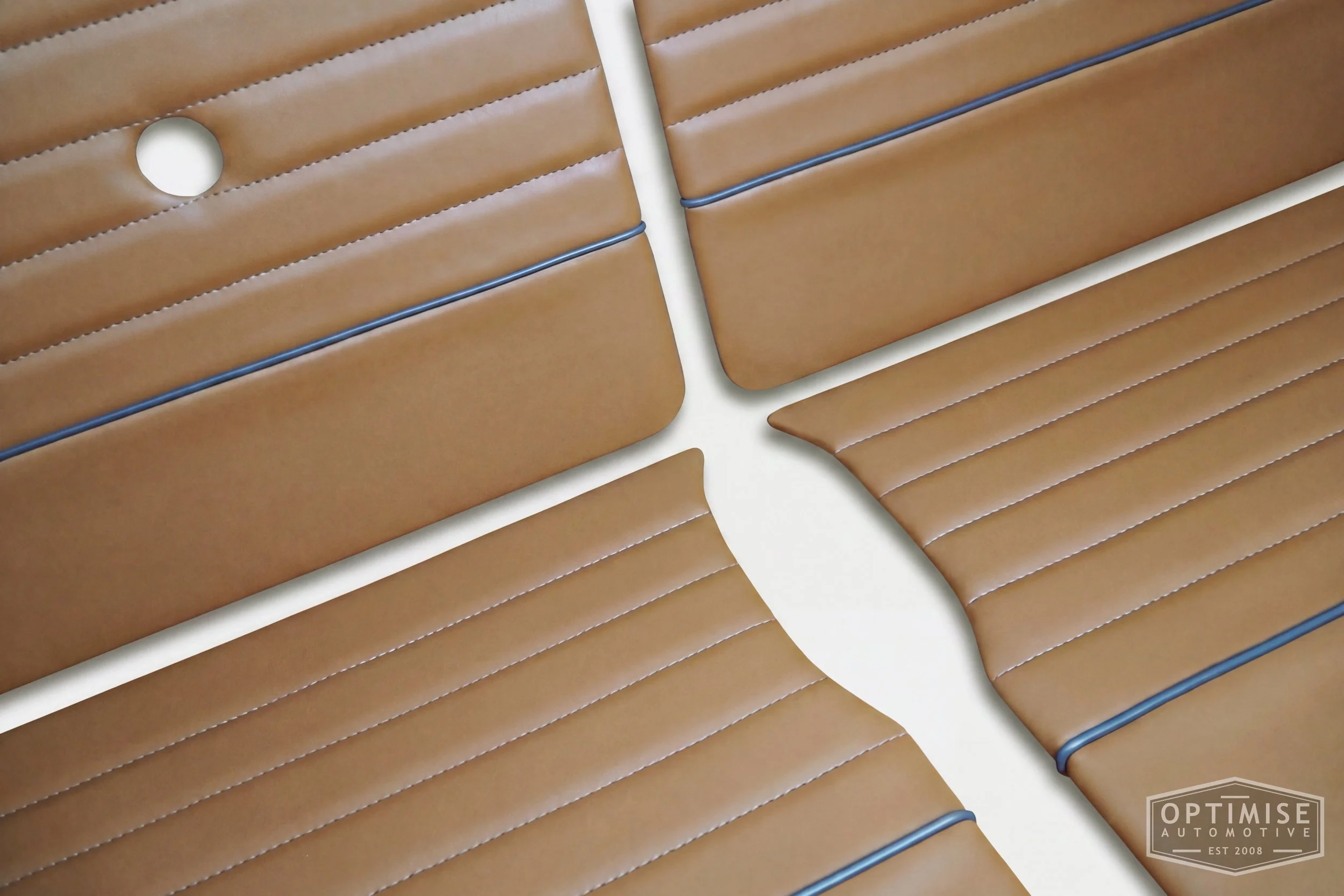 Classic Mini Monte-Carlo Plus door cards, trimmed in light brown (tan) vinyl leatherette with dark grey piping & stitching.