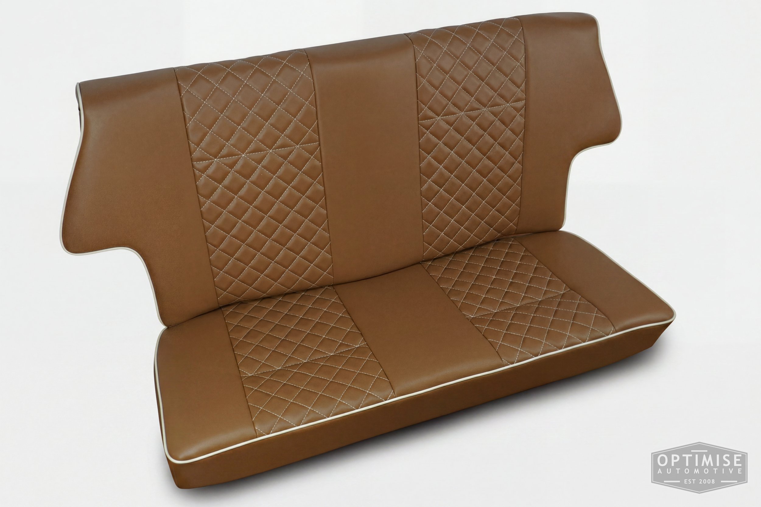 Classic Mini non-reclining seat retrims, trimmed in light brown (tan) leatherette with cream piping and cream diamond stitching.