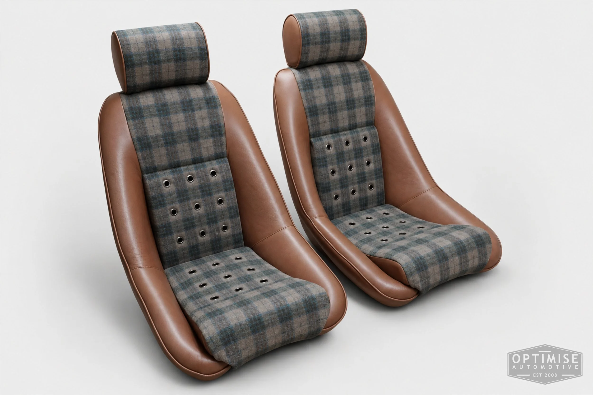 Classic Mini seat retrims featuring Cobra Classic RS front seats and a matching MPi rear seat, trimmed in Norfolk Check Tweed 0834 and Crest Cambridge lark leather, with gunmetal eyelets.