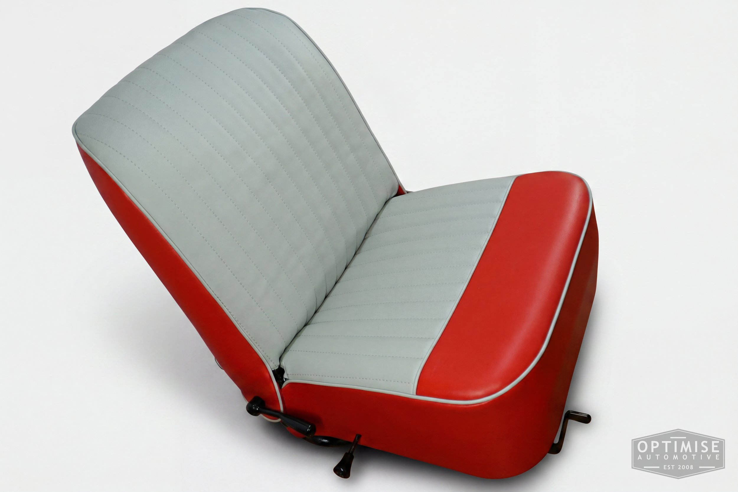 Classic Mini reclining seat retrims, trimmed in red and light grey vinyl leatherette.