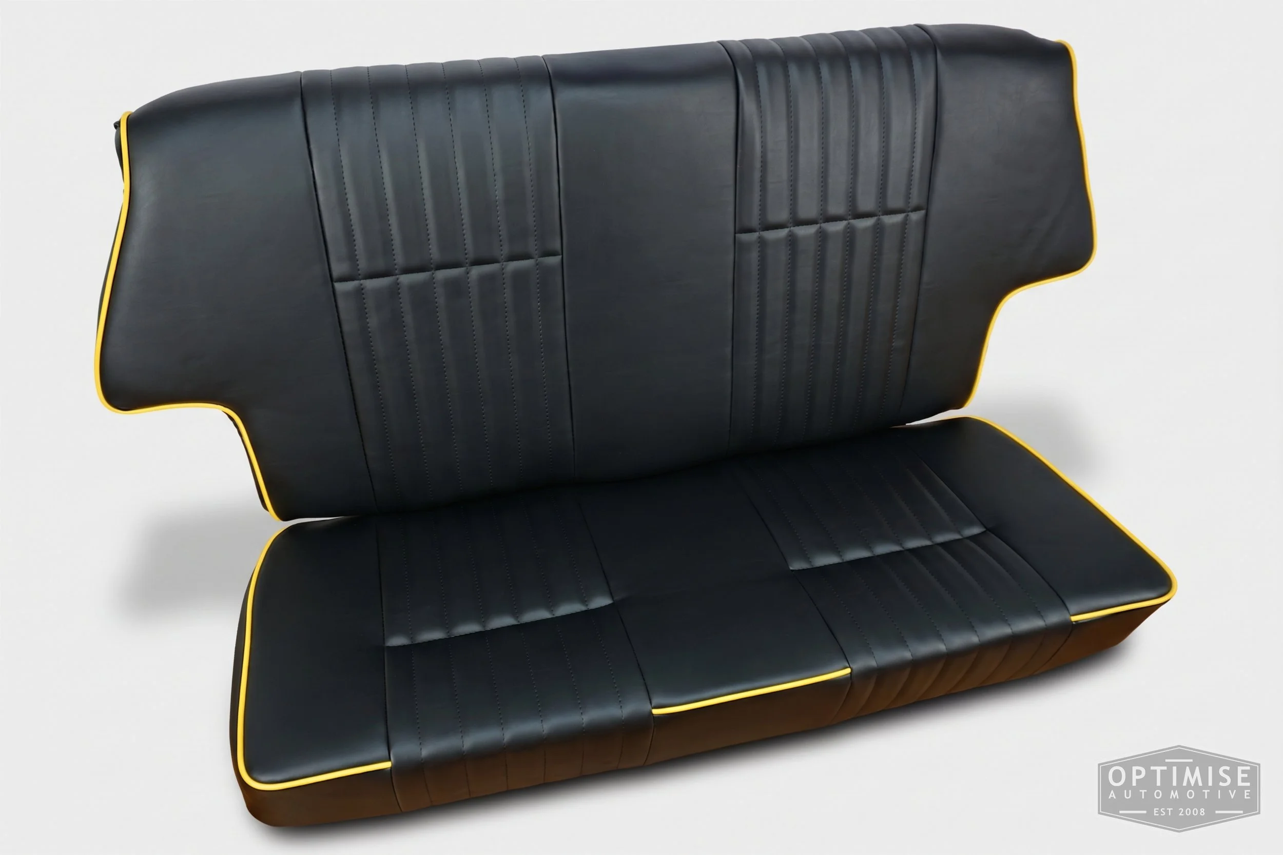 Classic Mini SPi seat retrims, trimmed in black leatherette with yellow piping and stitching.