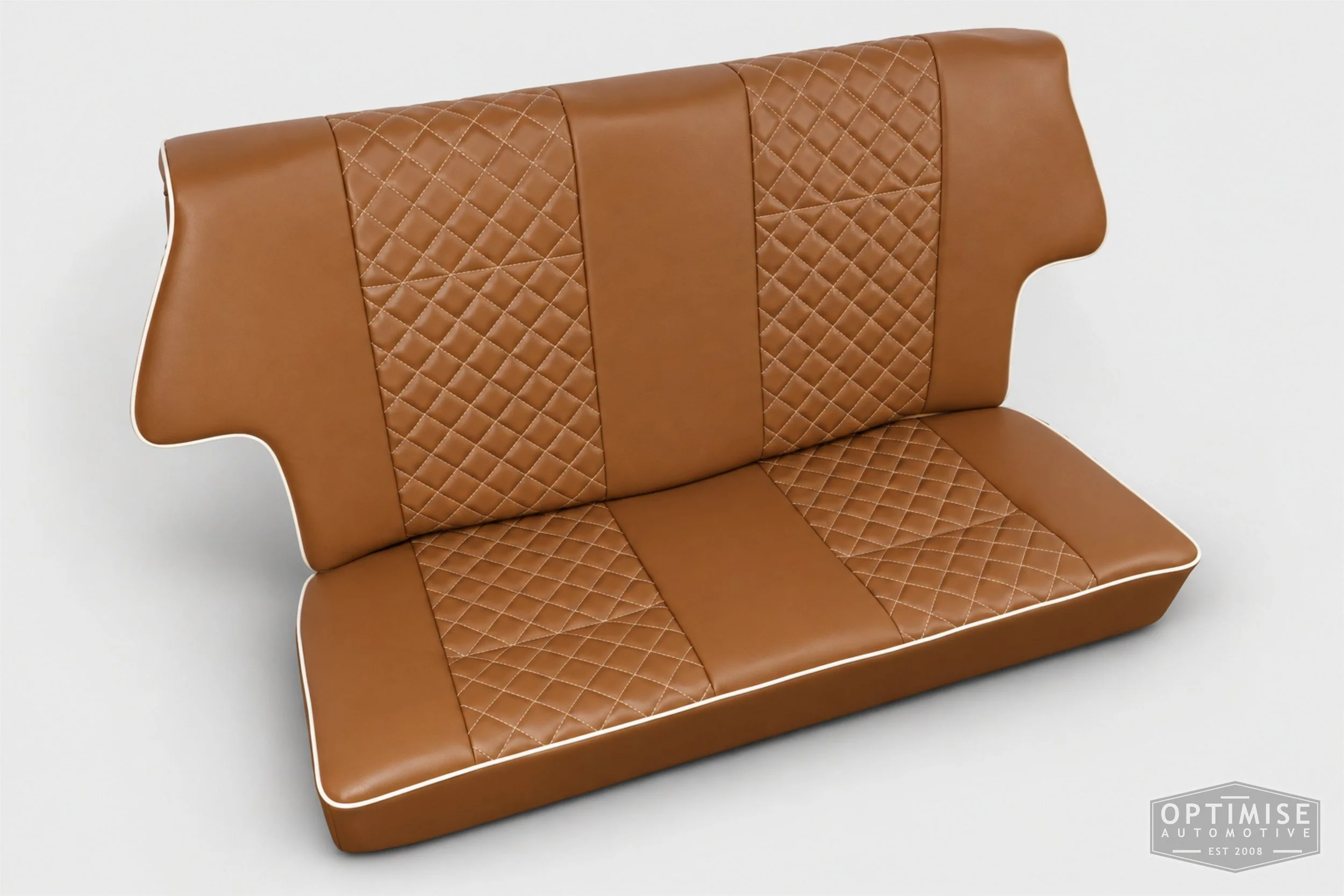 Classic Mini seat retrims featuring original early MK3 vertical-leg non-reclining front seats and a matching early MK3 rear seat, trimmed in tan leatherette with cream diamond stitching and piping.