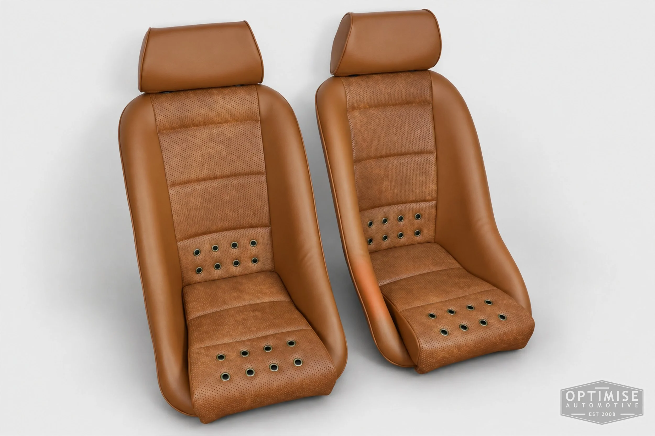 Classic Mini seat retrims featuring Cobra Classic front seats, trimmed in tan leatherette and tan basketweave  with bronze eyelets.