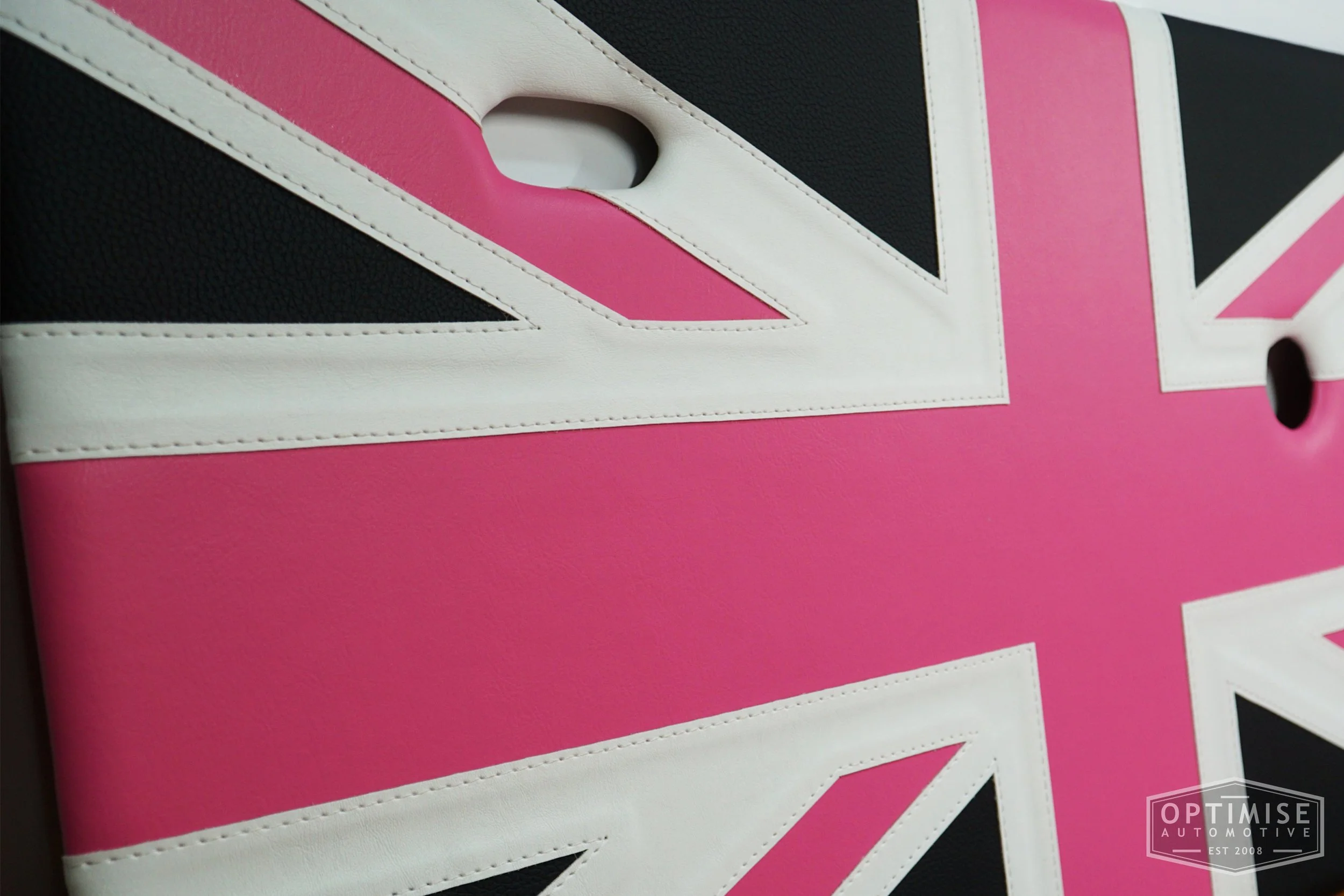 Classic Mini Union Jack door cards, trimmed in pink, white and black.