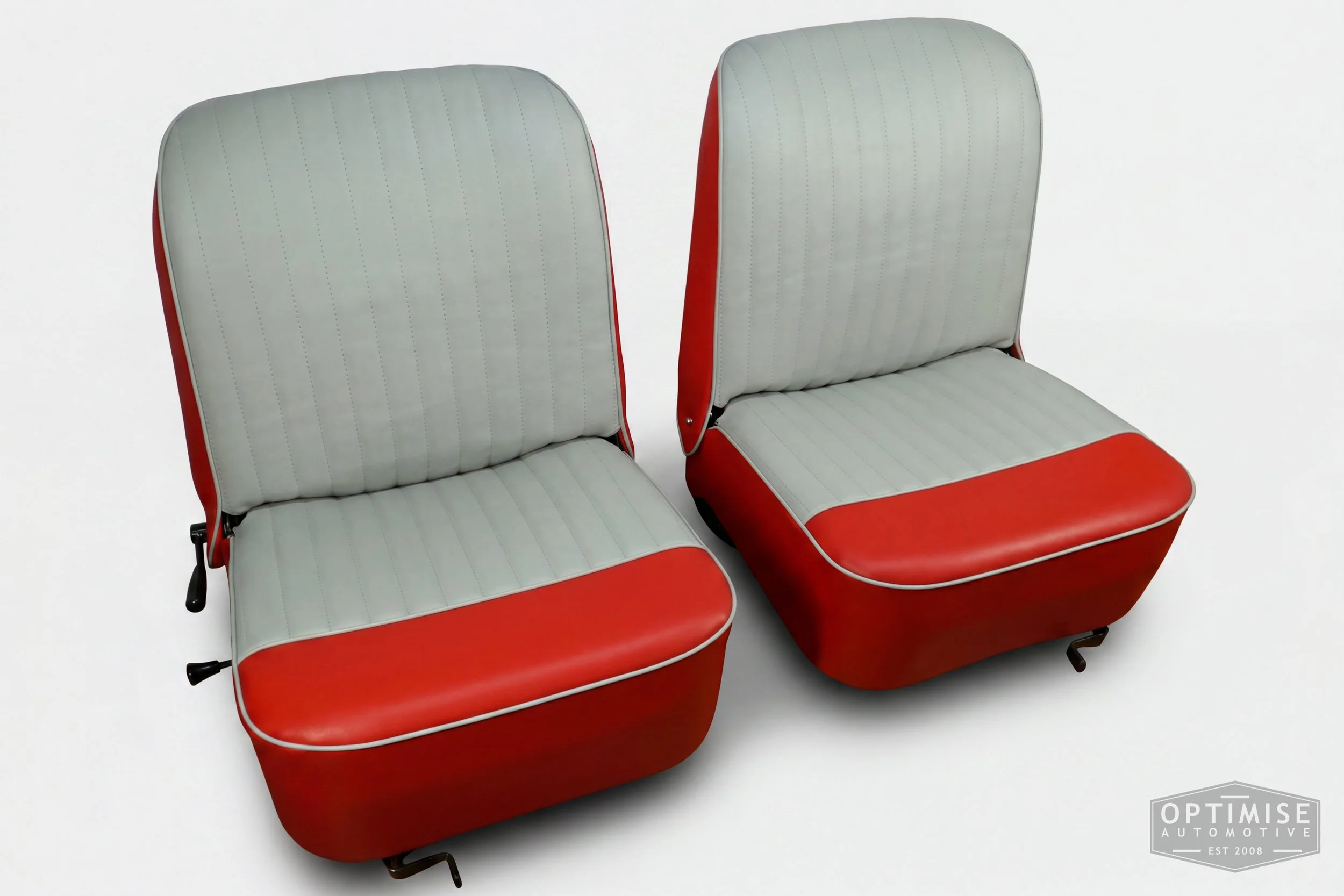 Classic Mini reclining seat retrims, trimmed in red and light grey vinyl leatherette.