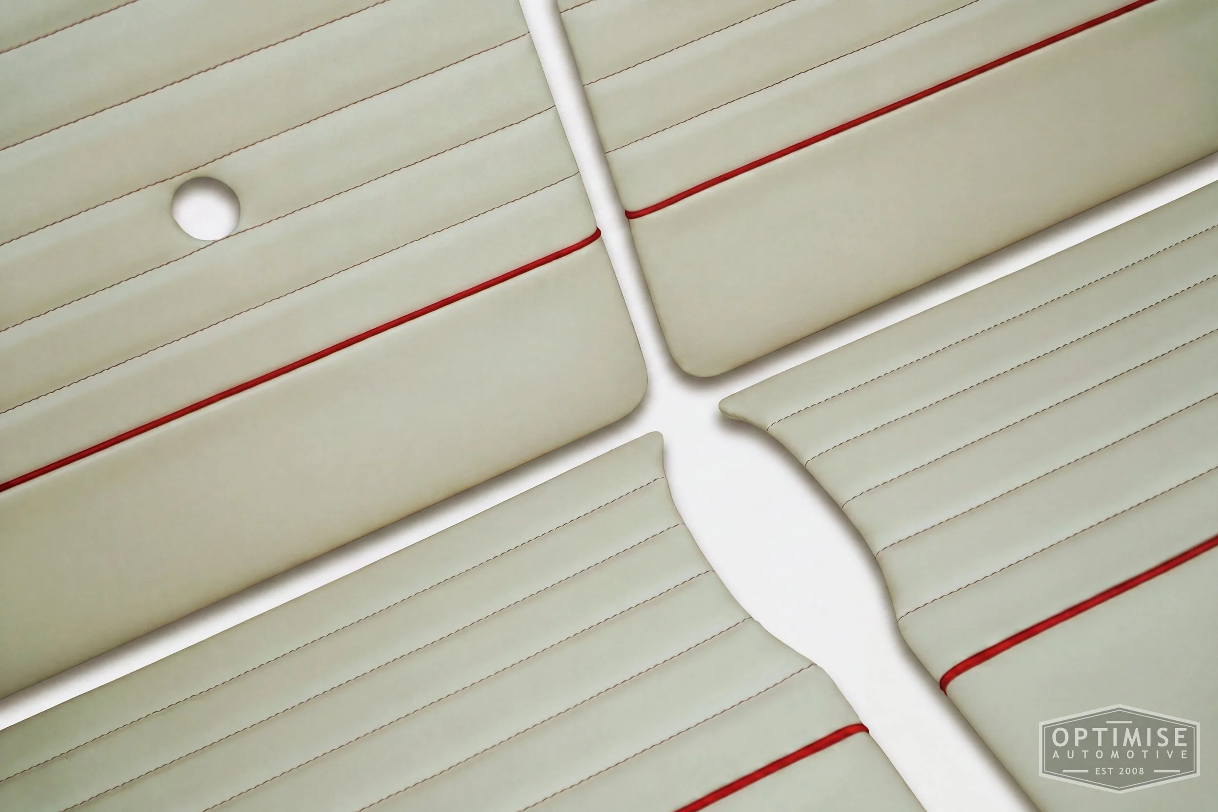Classic Mini Monte-Carlo Plus door cards, trimmed in cream vinyl leatherette with red piping & stitching.