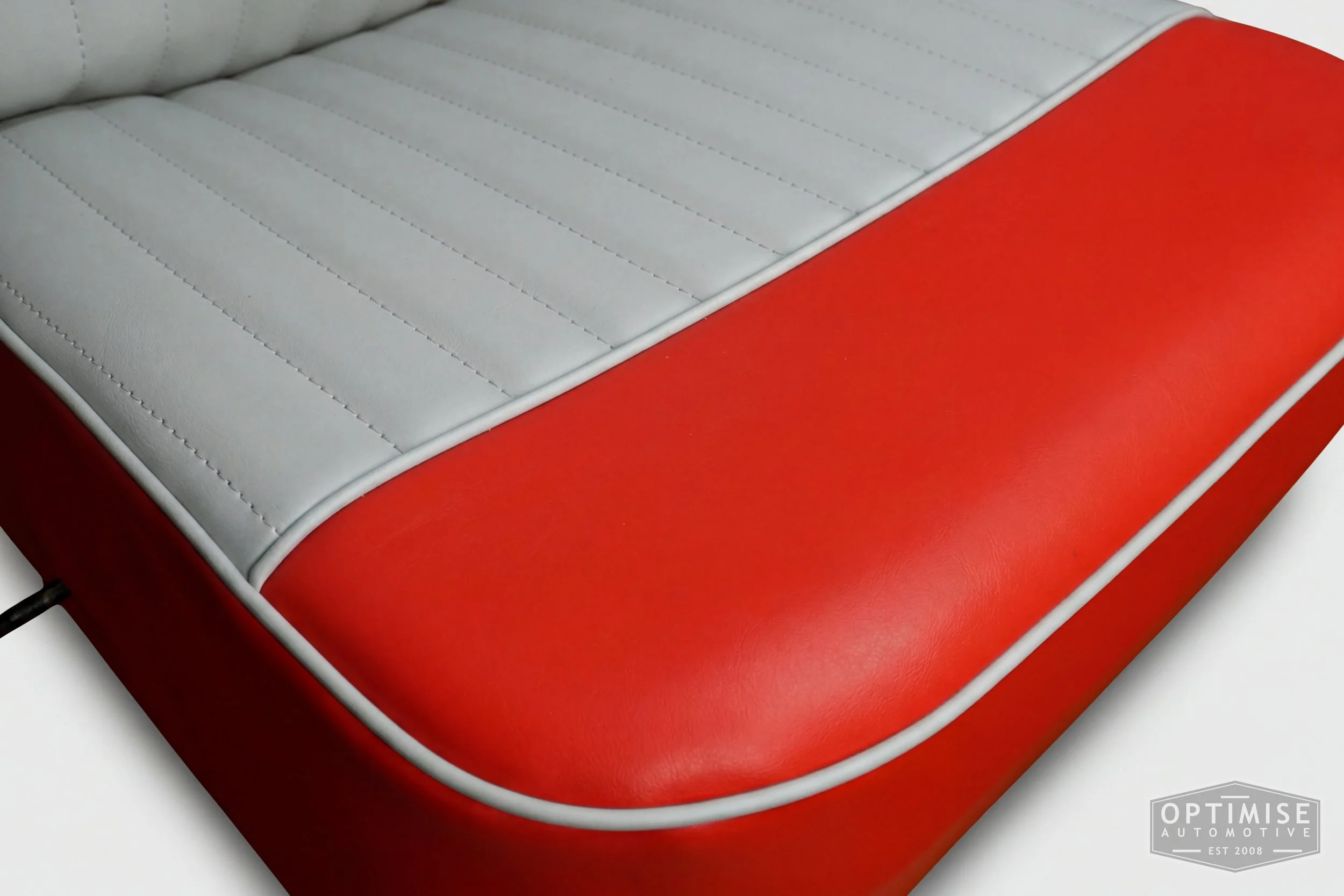 Classic Mini reclining seat retrims, trimmed in red and light grey vinyl leatherette.