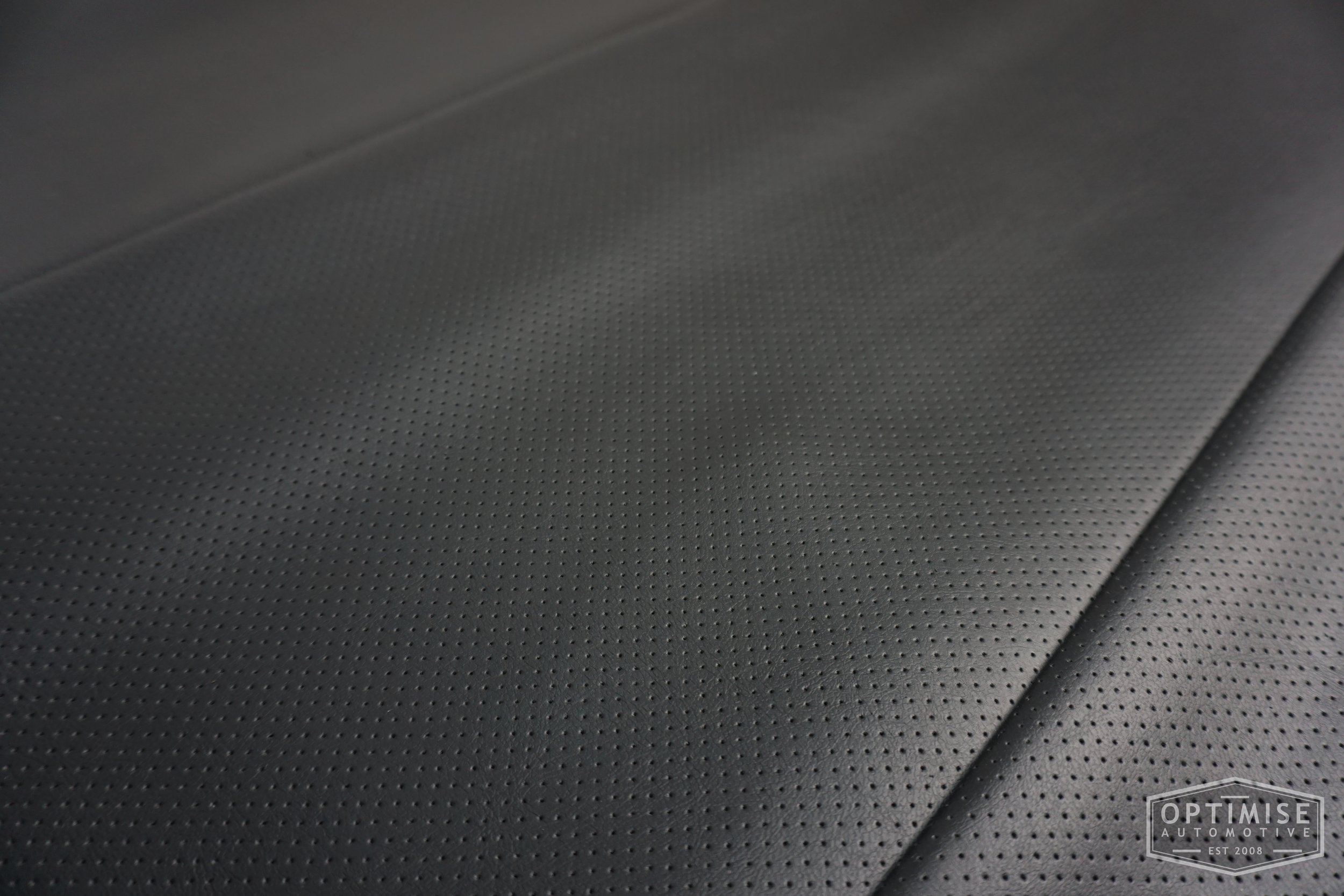 Classic Mini headlining kit, trimmed in black perforated vinyl leatherette.