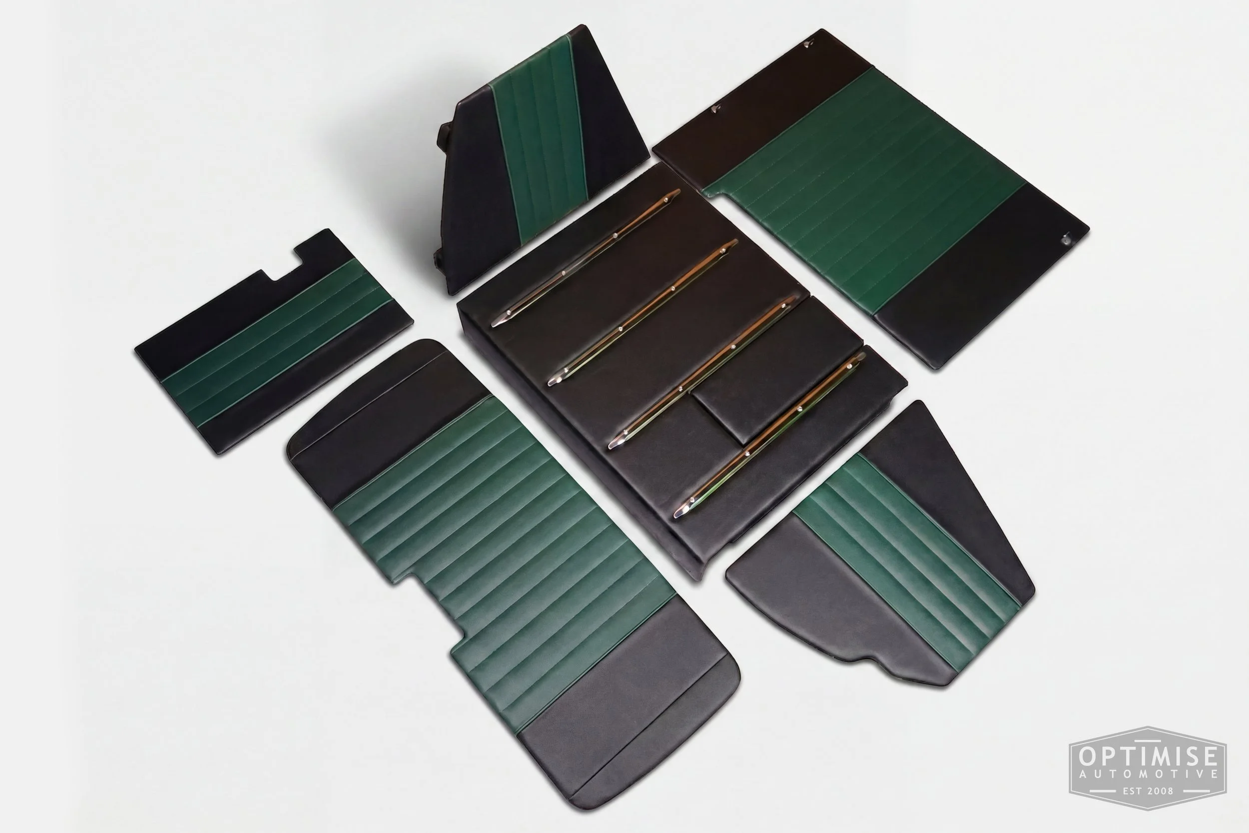 Classic Mini leatherette boot lining kit, trimmed in black and dark green leatherette with dark green piping and dark green stitching.