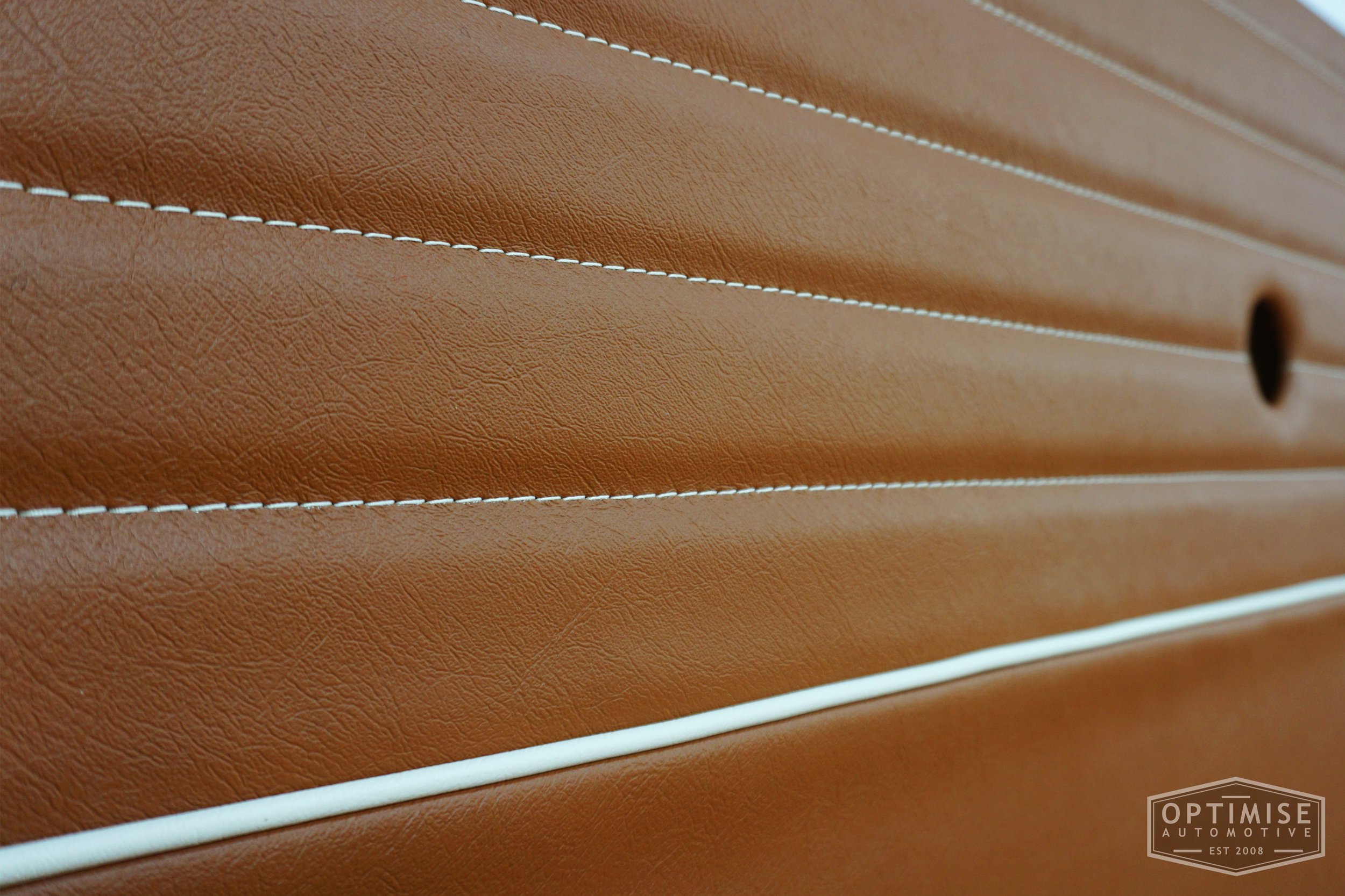 Classic Mini Monte-Carlo Plus door cards, trimmed in light brown (tan) vinyl leatherette with off-white piping & stitching.